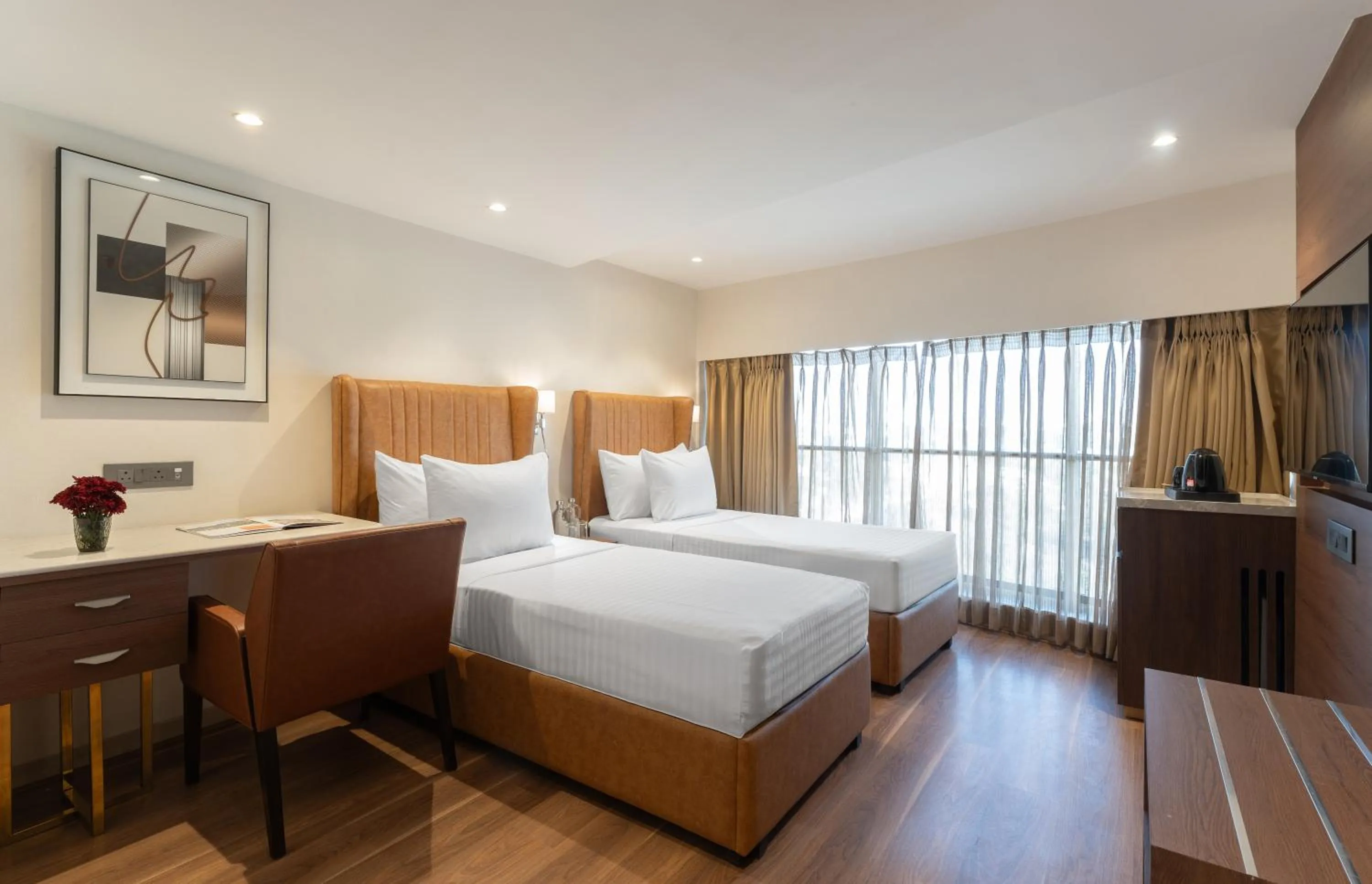 Bedroom, Bed in Clarks Inn Suites Hyderabad Airport