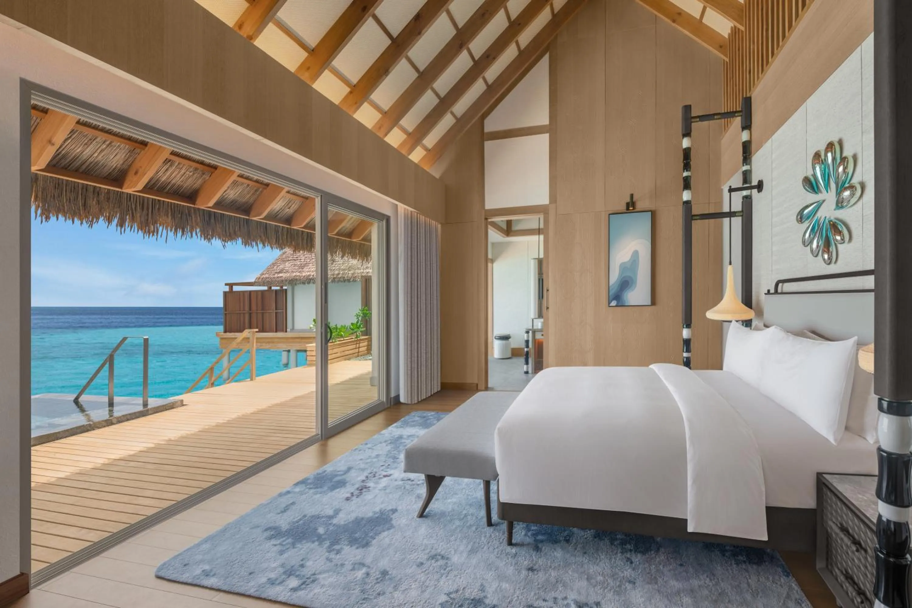 Bed in JW Marriott Maldives Kaafu Atoll Island Resort