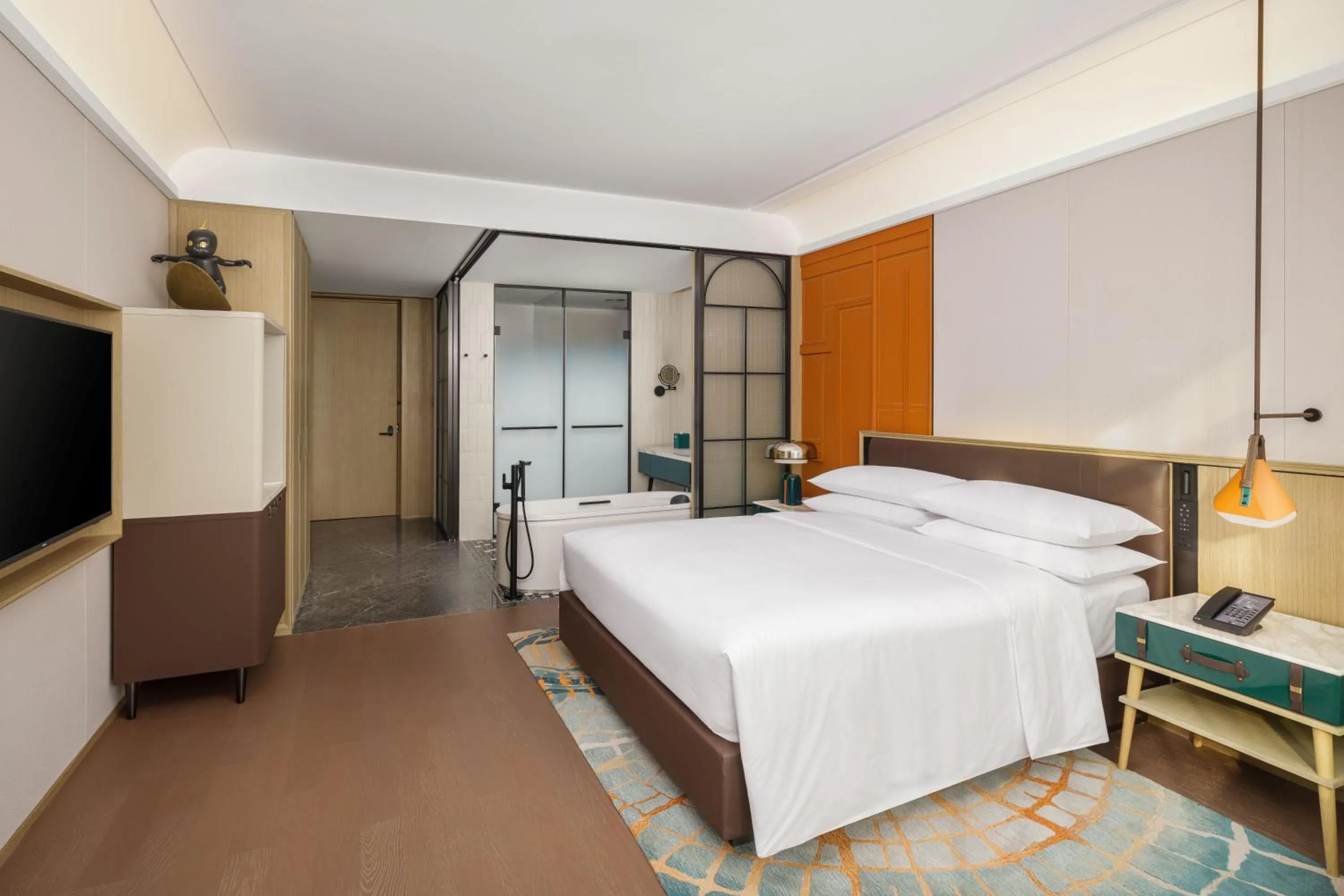 Bed in Renaissance Qingdao Hotel