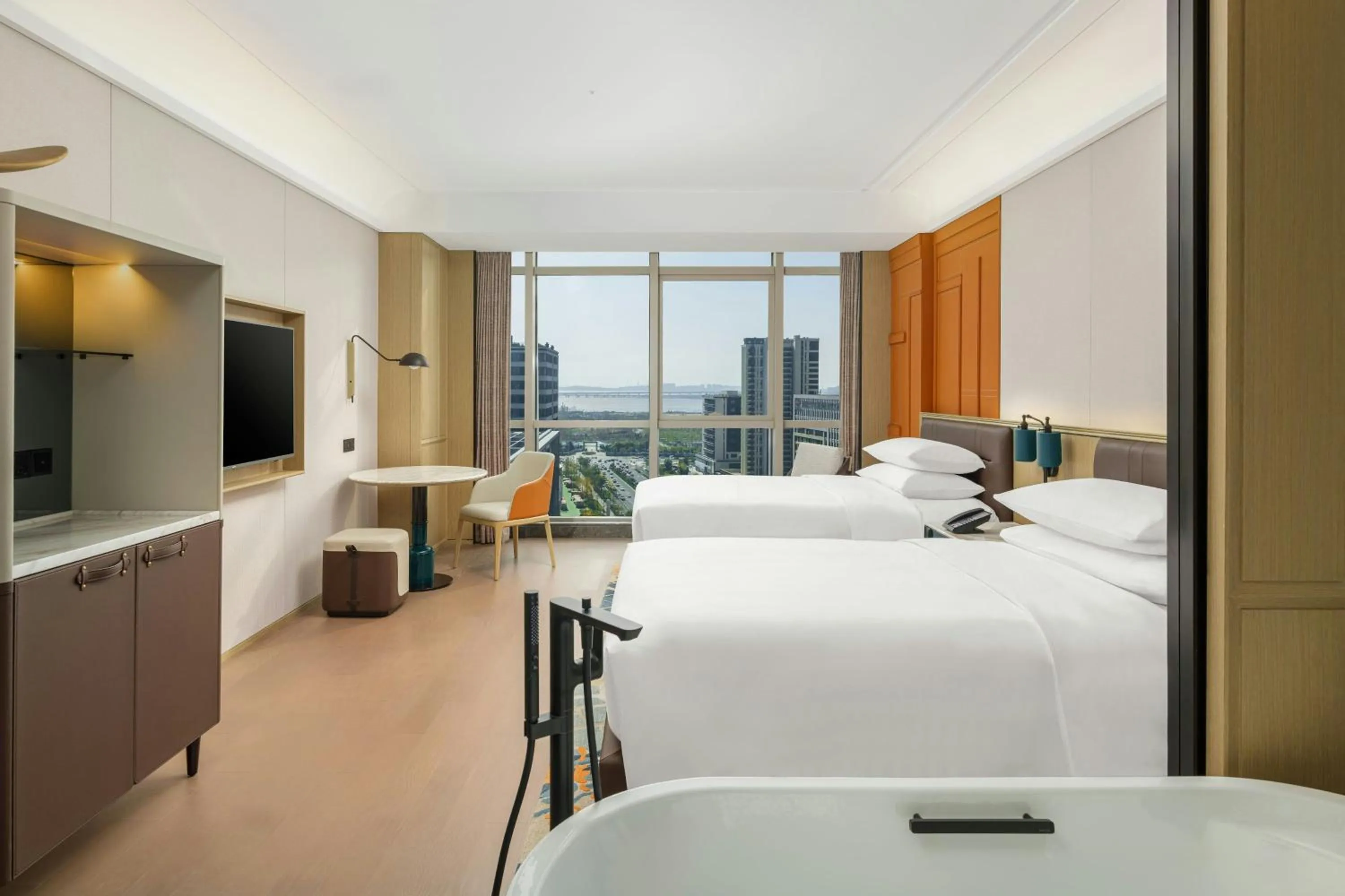 Photo of the whole room, Bed in Renaissance Qingdao Hotel