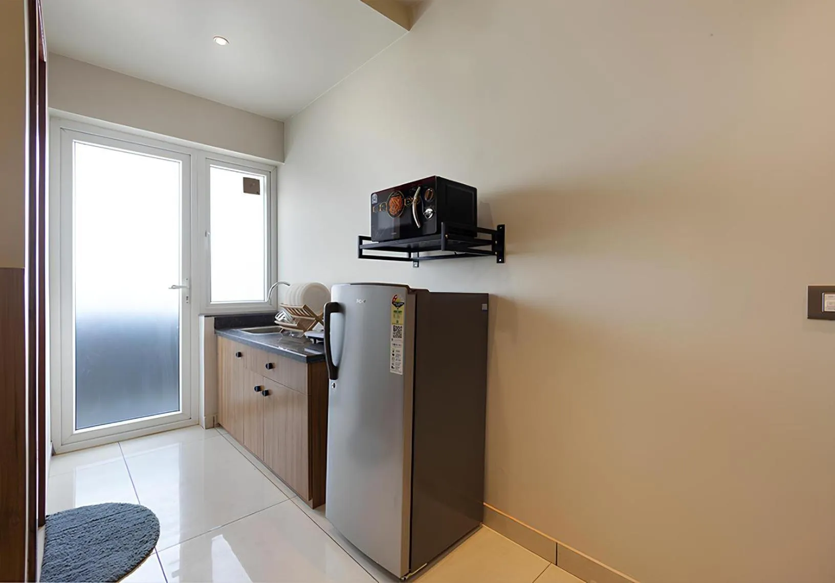 Kitchen or kitchenette in Wandr Hotel Medicity Gurugram, Near Medanta Hospital