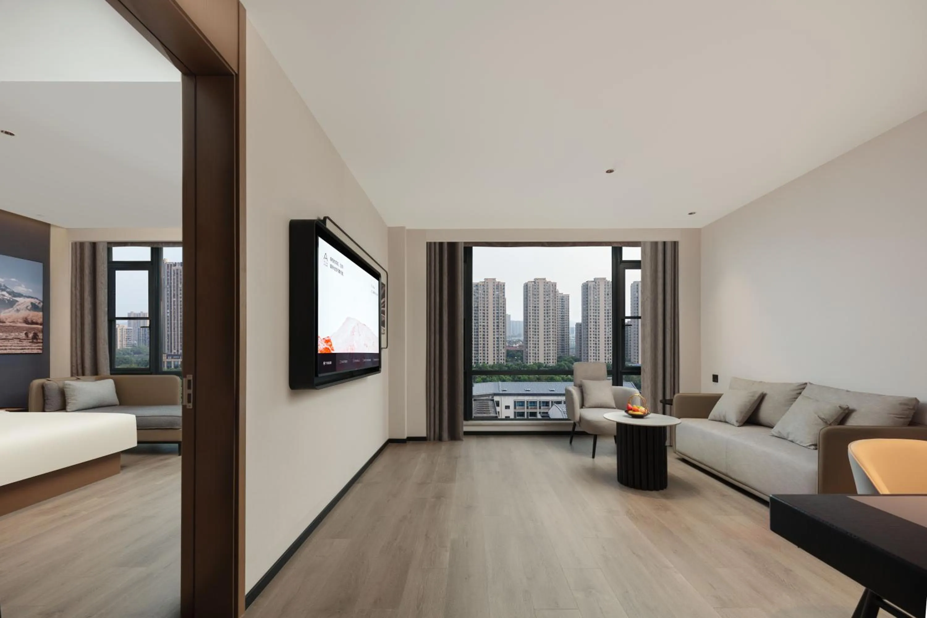 Living room, Bed in Atour Hotel Hangzhou Xiaoshan Kaiyuan Plaza