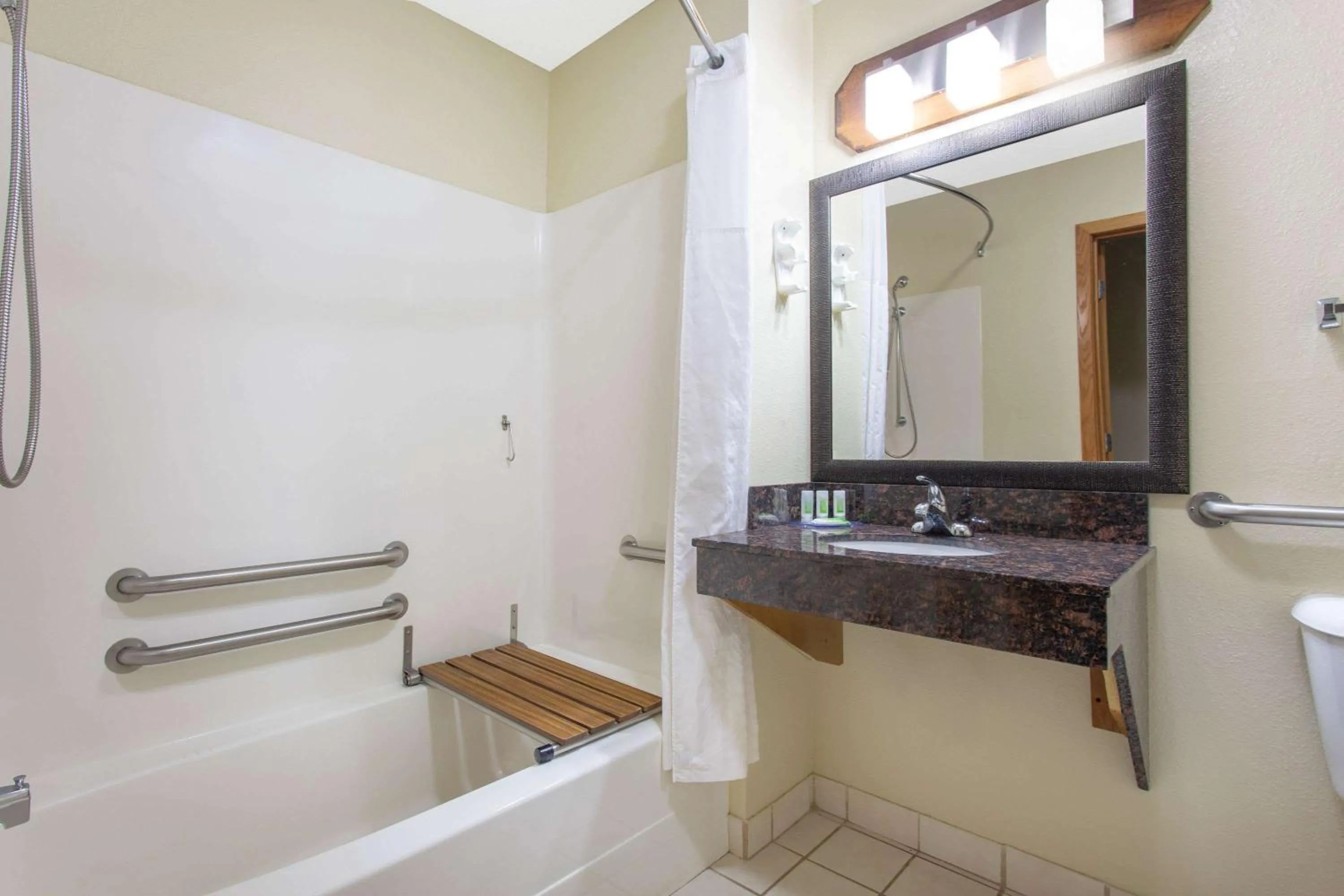 Bathroom in AmericInn by Wyndham Black River Falls I-94 on ATV Trail