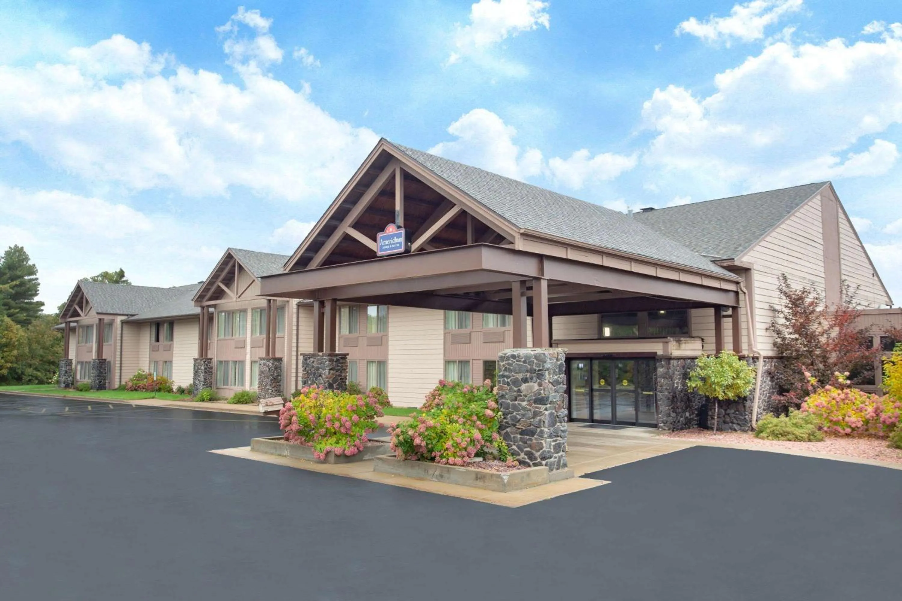 Property building in AmericInn by Wyndham Black River Falls I-94 on ATV Trail