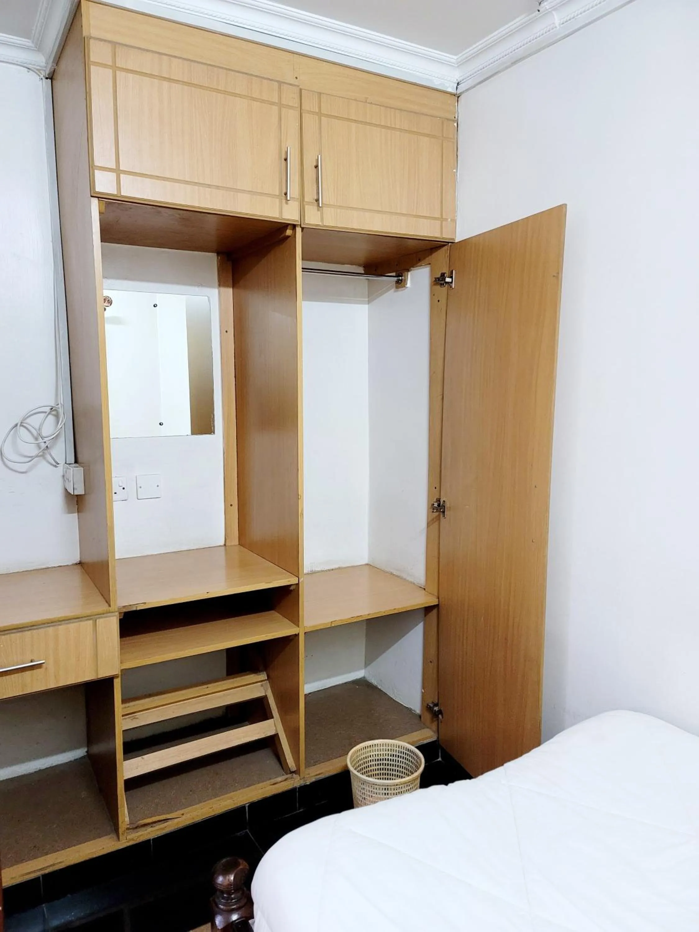 wardrobe, Bed in Nairobi Glory Palace Hotel