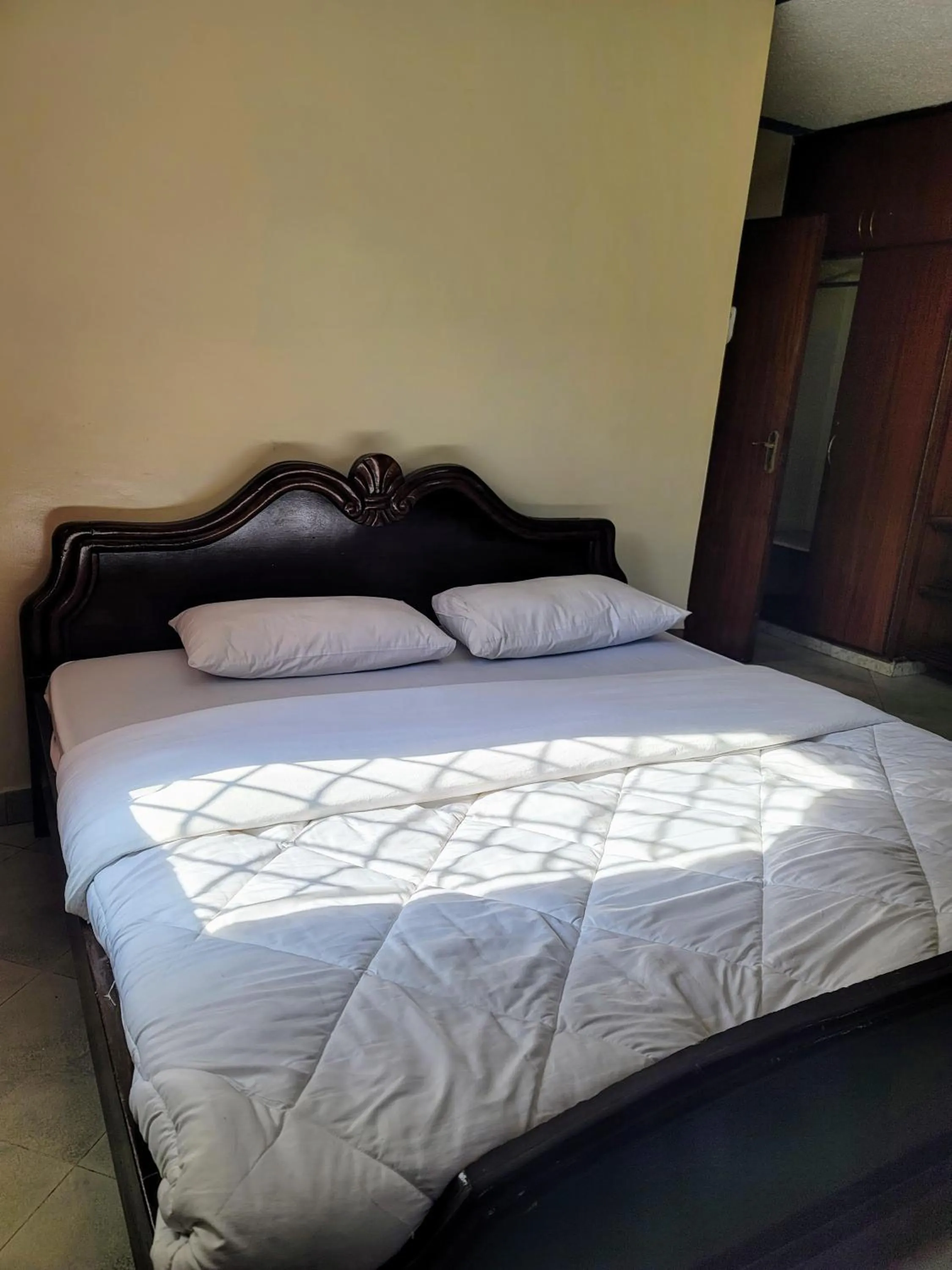 Bed in Nairobi Glory Palace Hotel