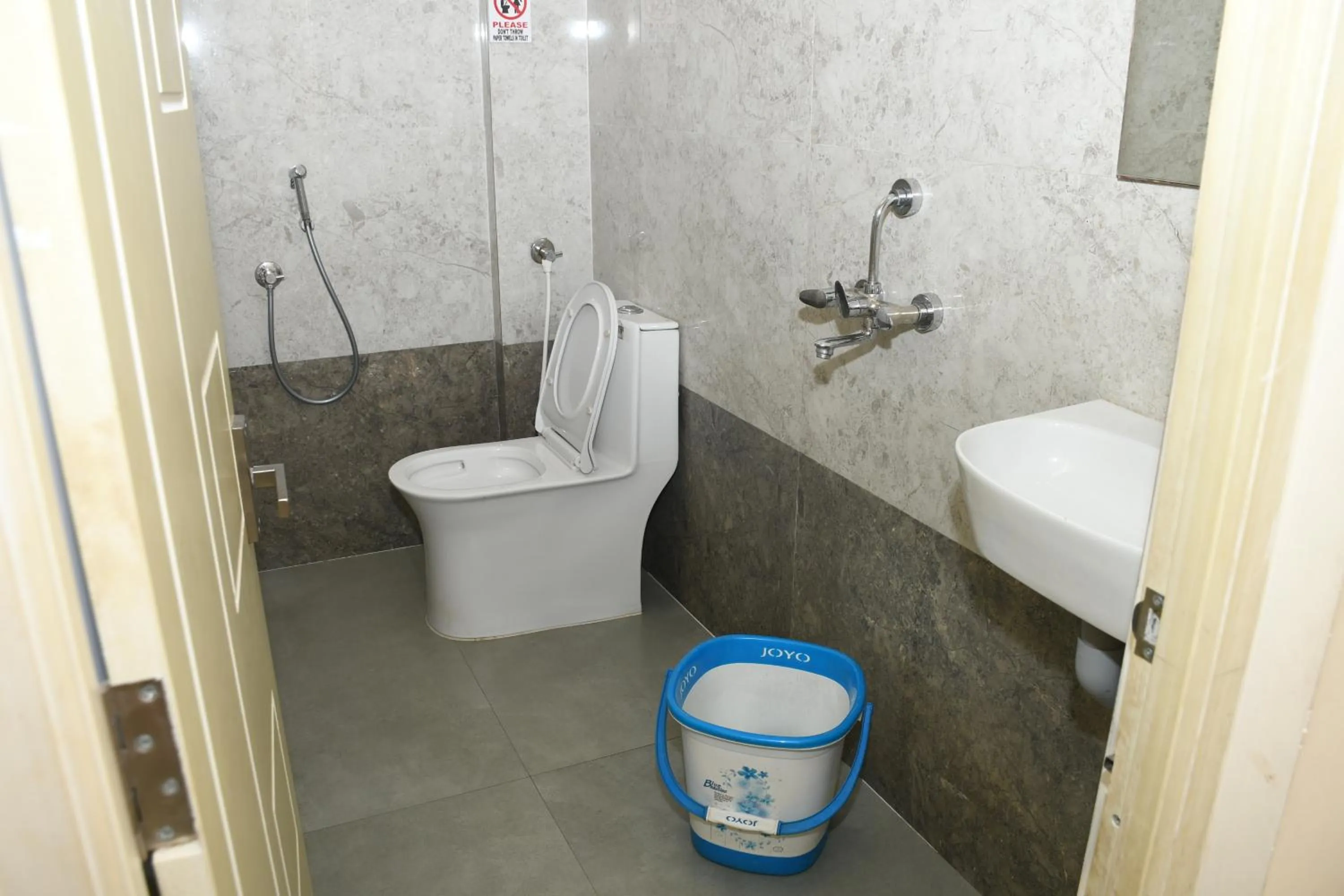 Bathroom in Vasantham Inn