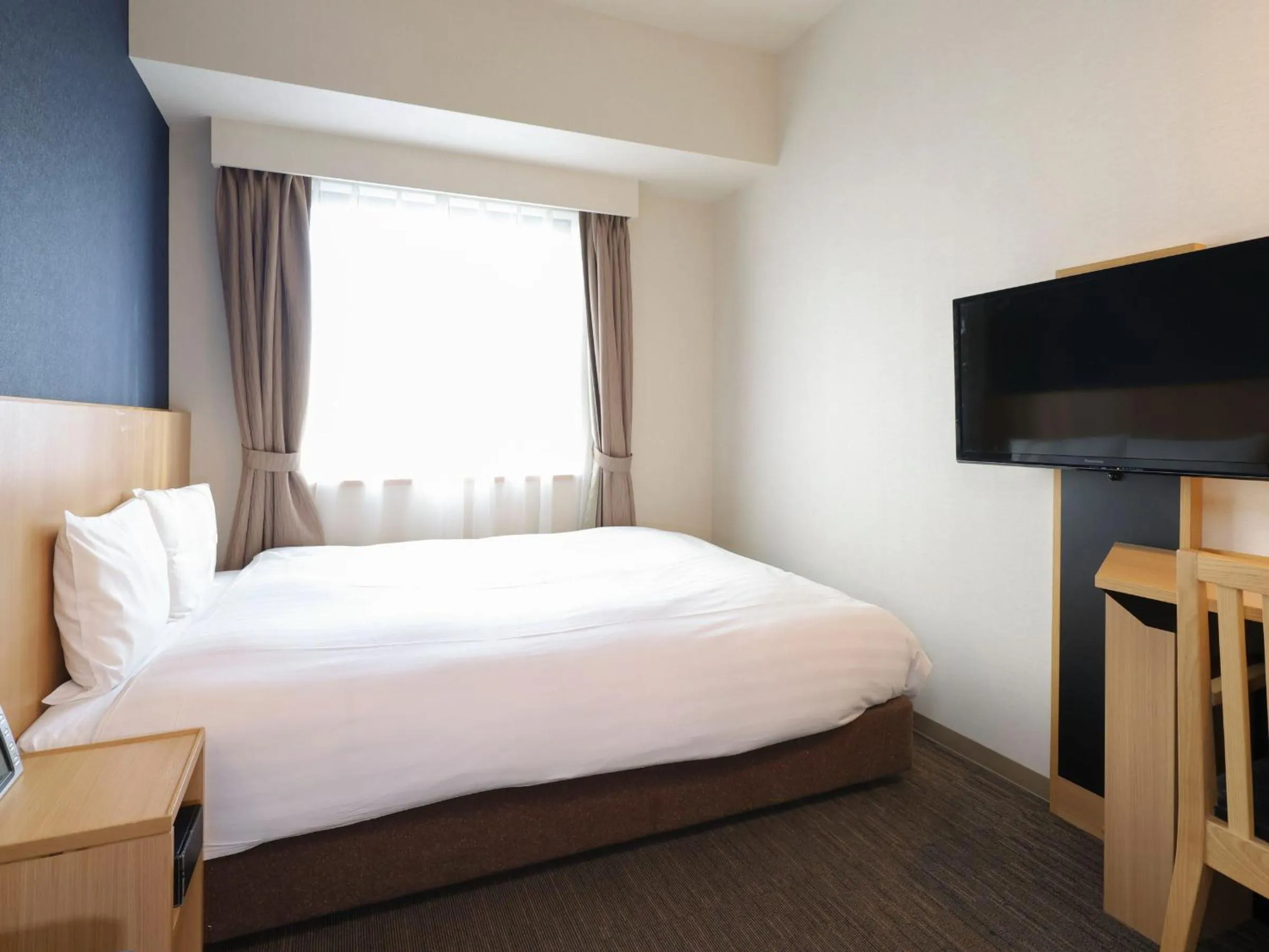 Photo of the whole room, Bed in Dormy Inn Ueno Okachimachi