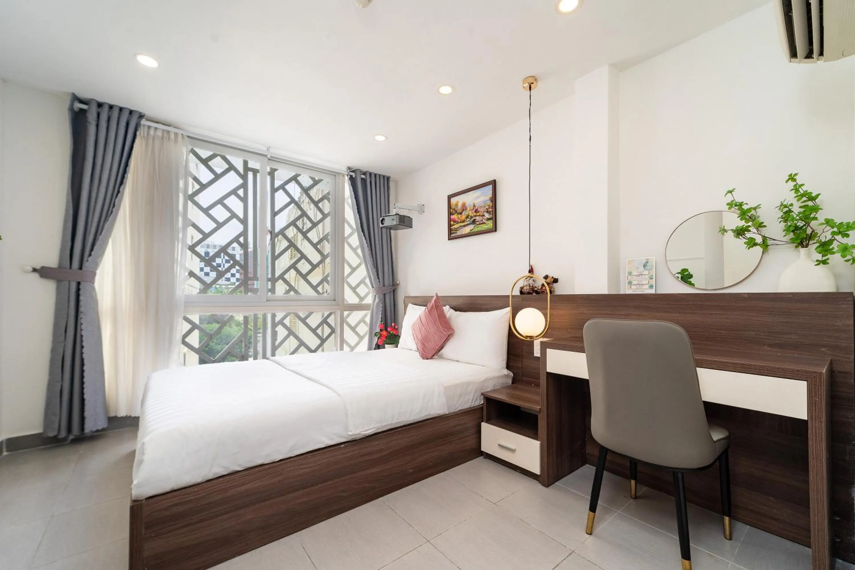 Bed in Galaxy Boutique Sai Gon Central Hotel