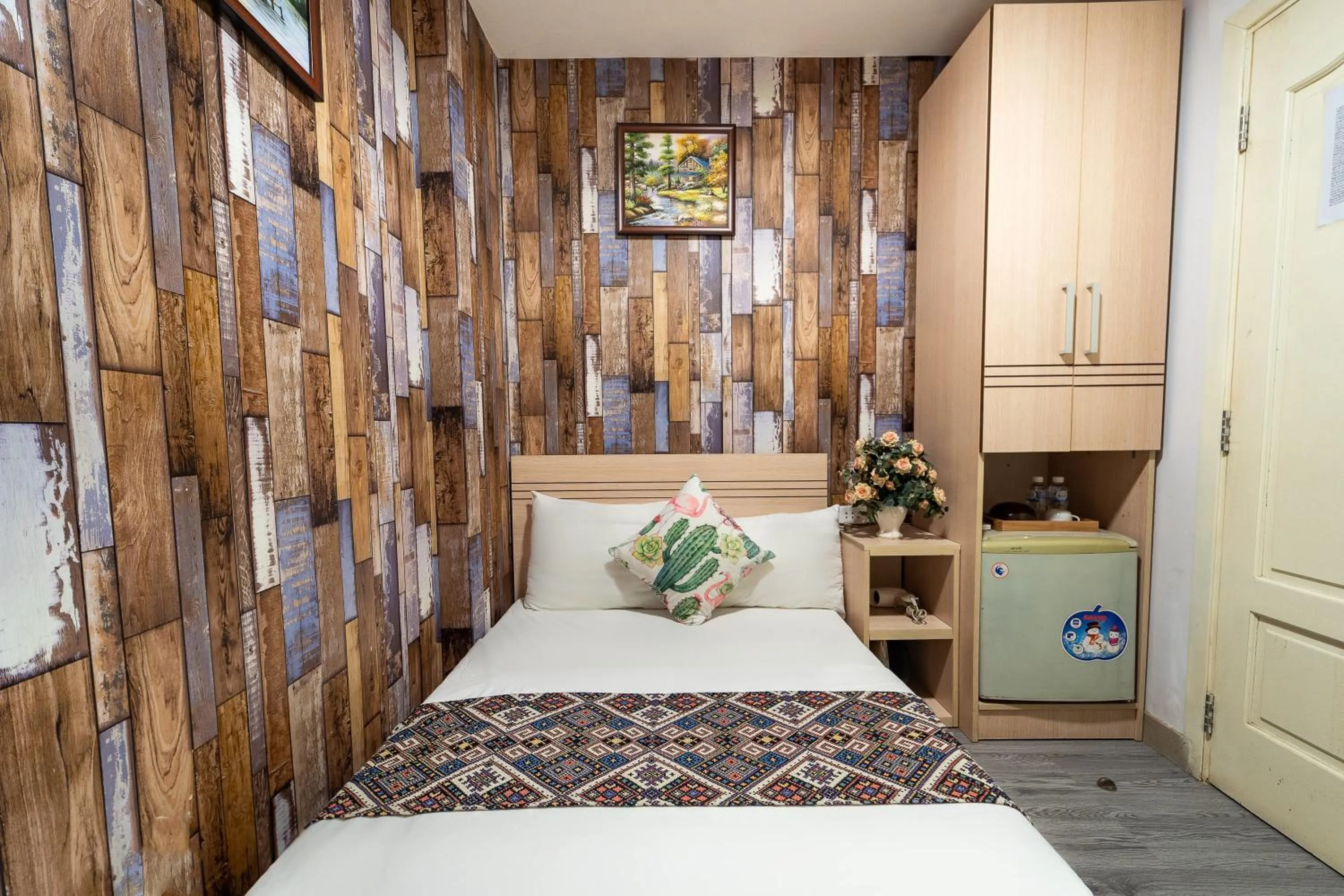 Bed in Galaxy Boutique Sai Gon Central Hotel