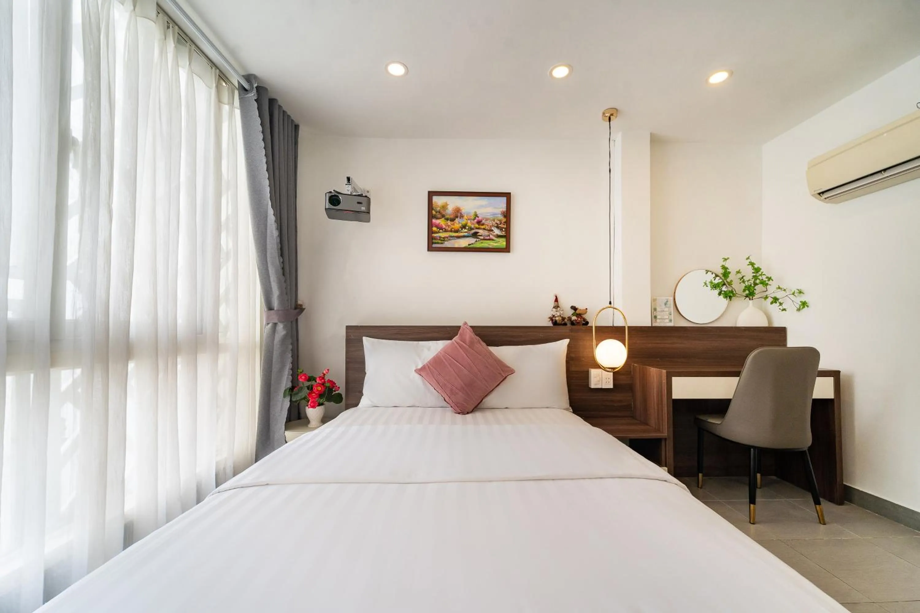 Bed in Galaxy Boutique Sai Gon Central Hotel