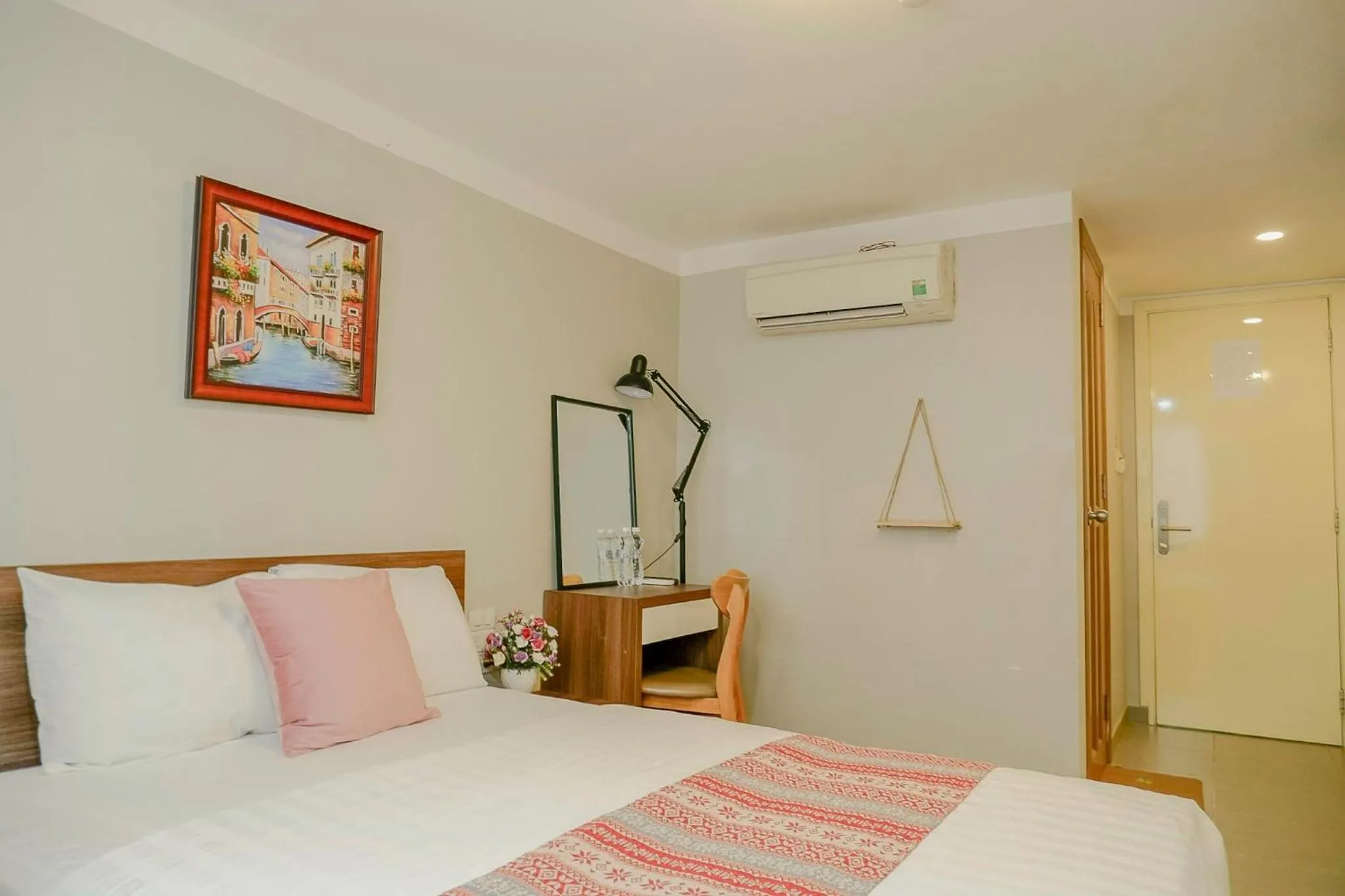 Bed in Galaxy Boutique Sai Gon Central Hotel