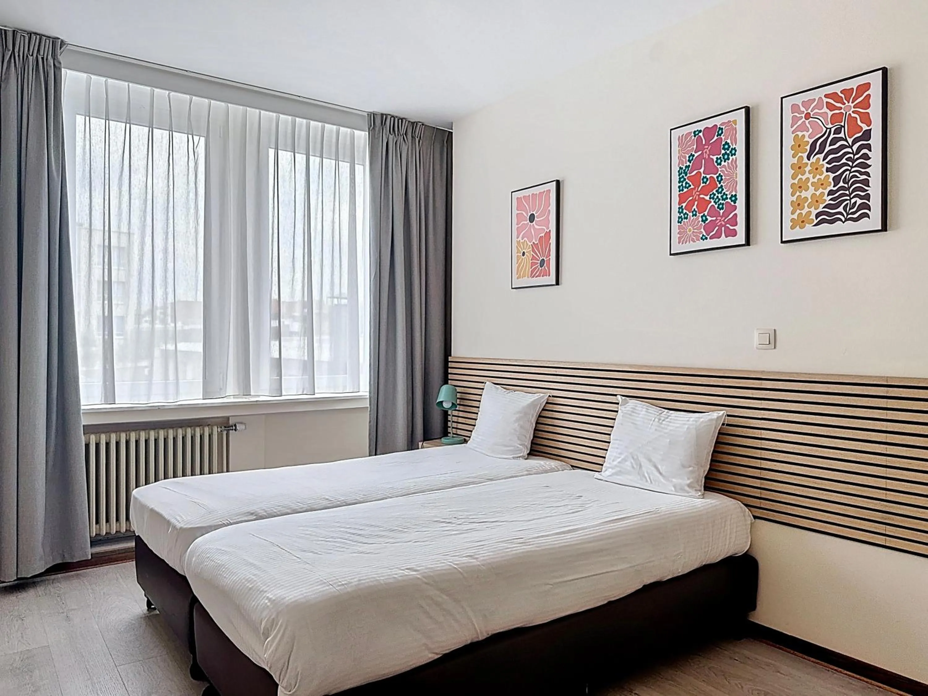 Bed in Slina Hotel Brussels