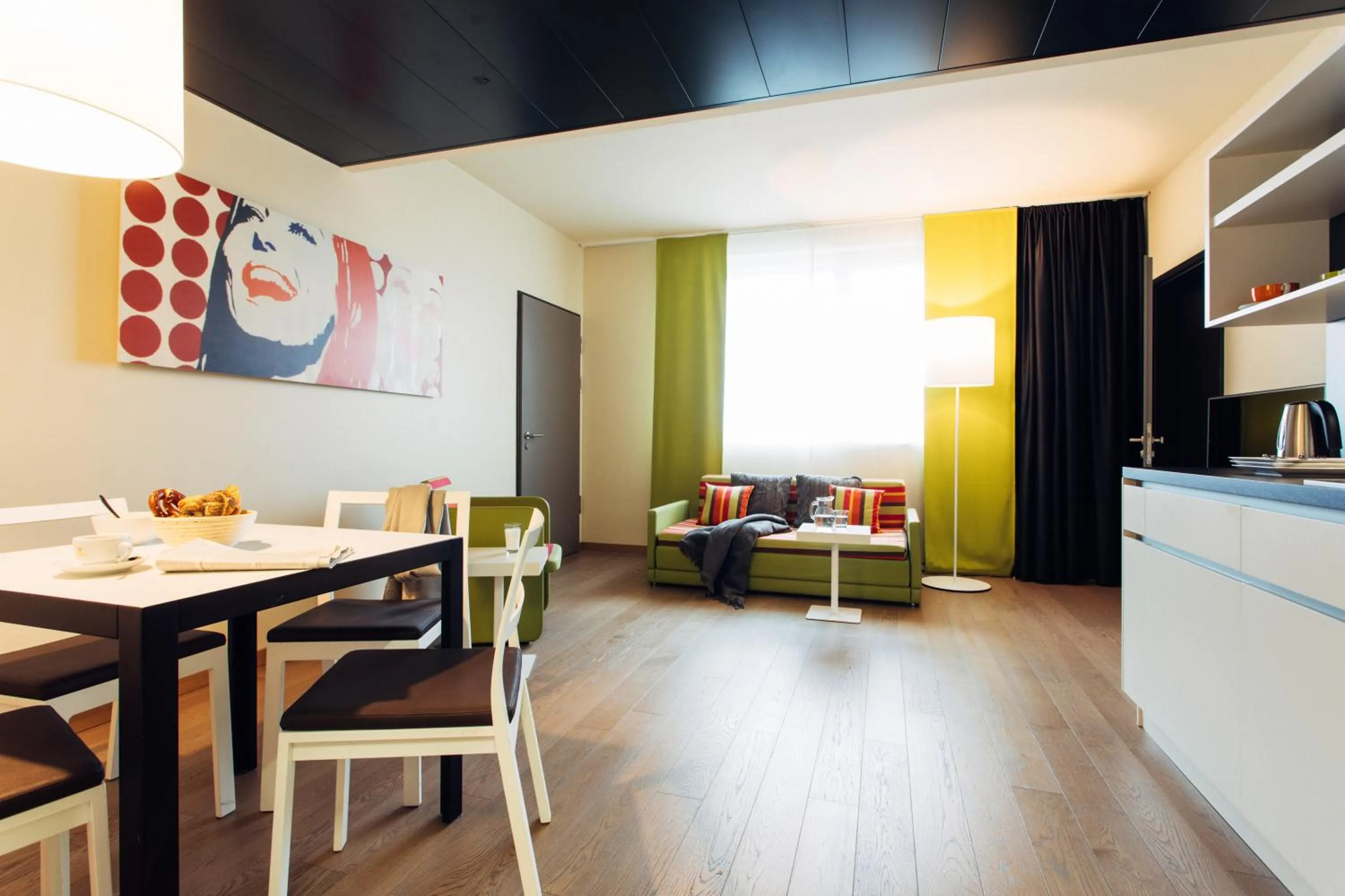 Living room in harry's home München hotel & apartments