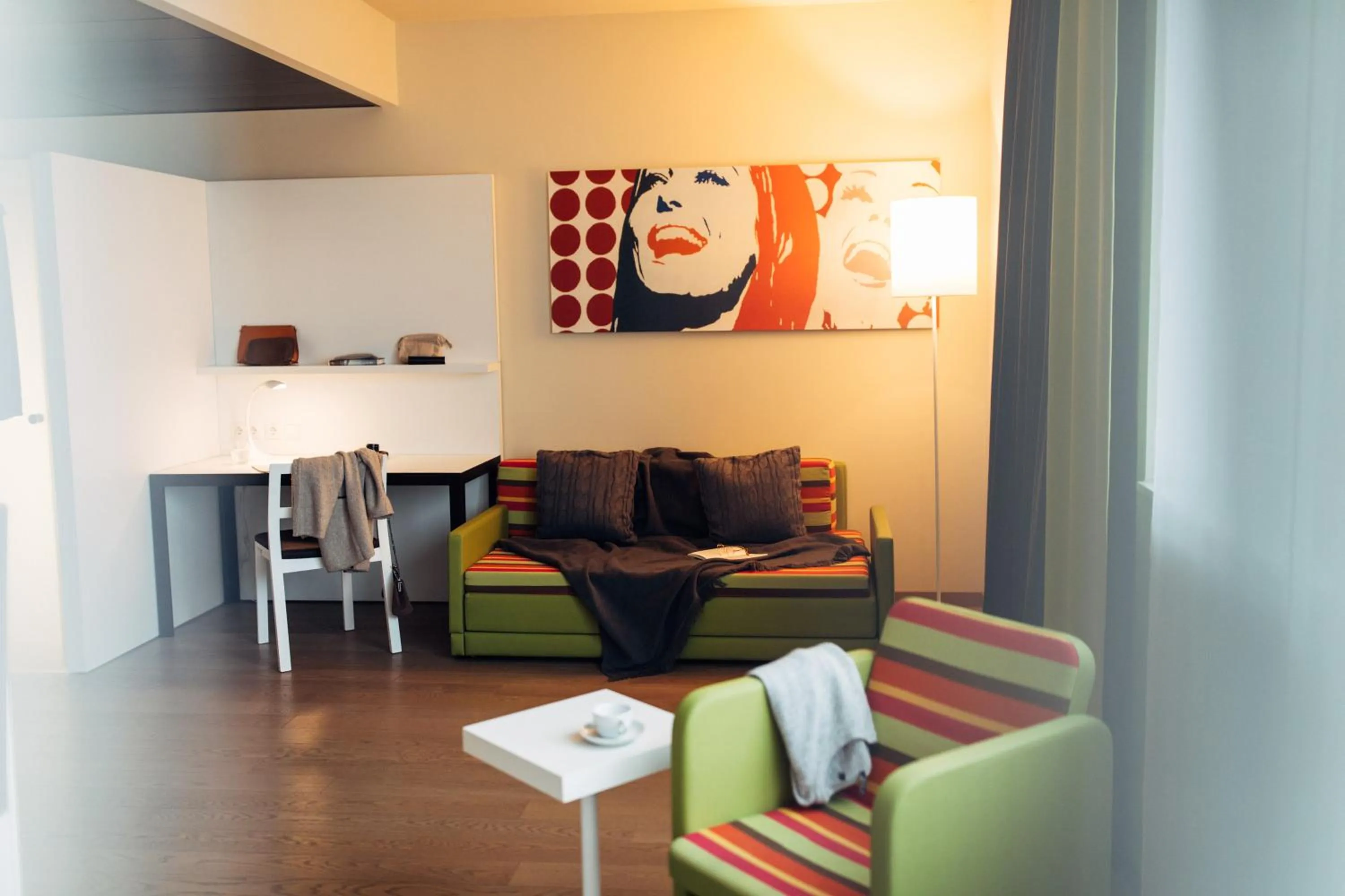 Living room in harry's home München hotel & apartments