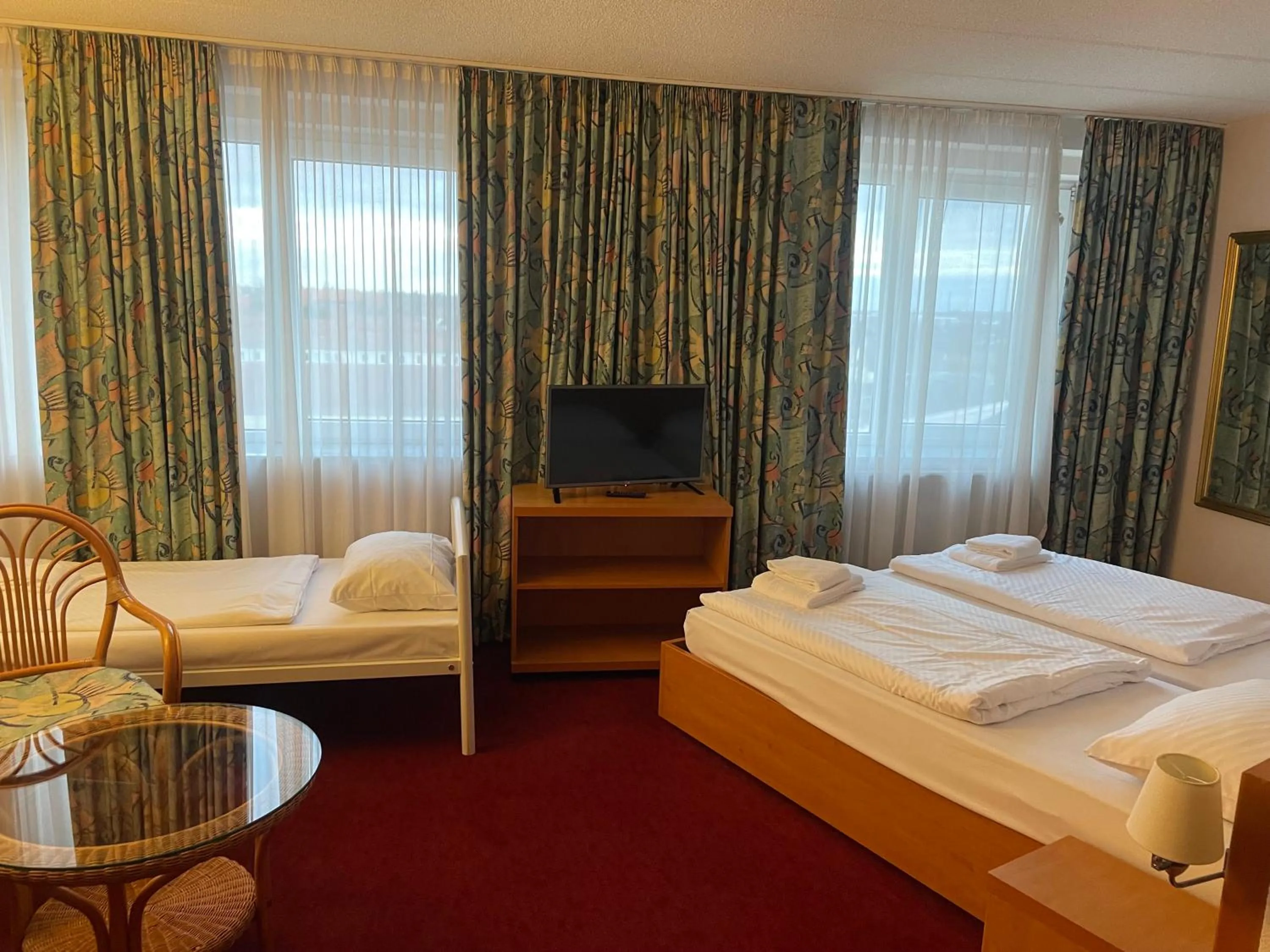 Bed in TRIP INN Axxon Hotel