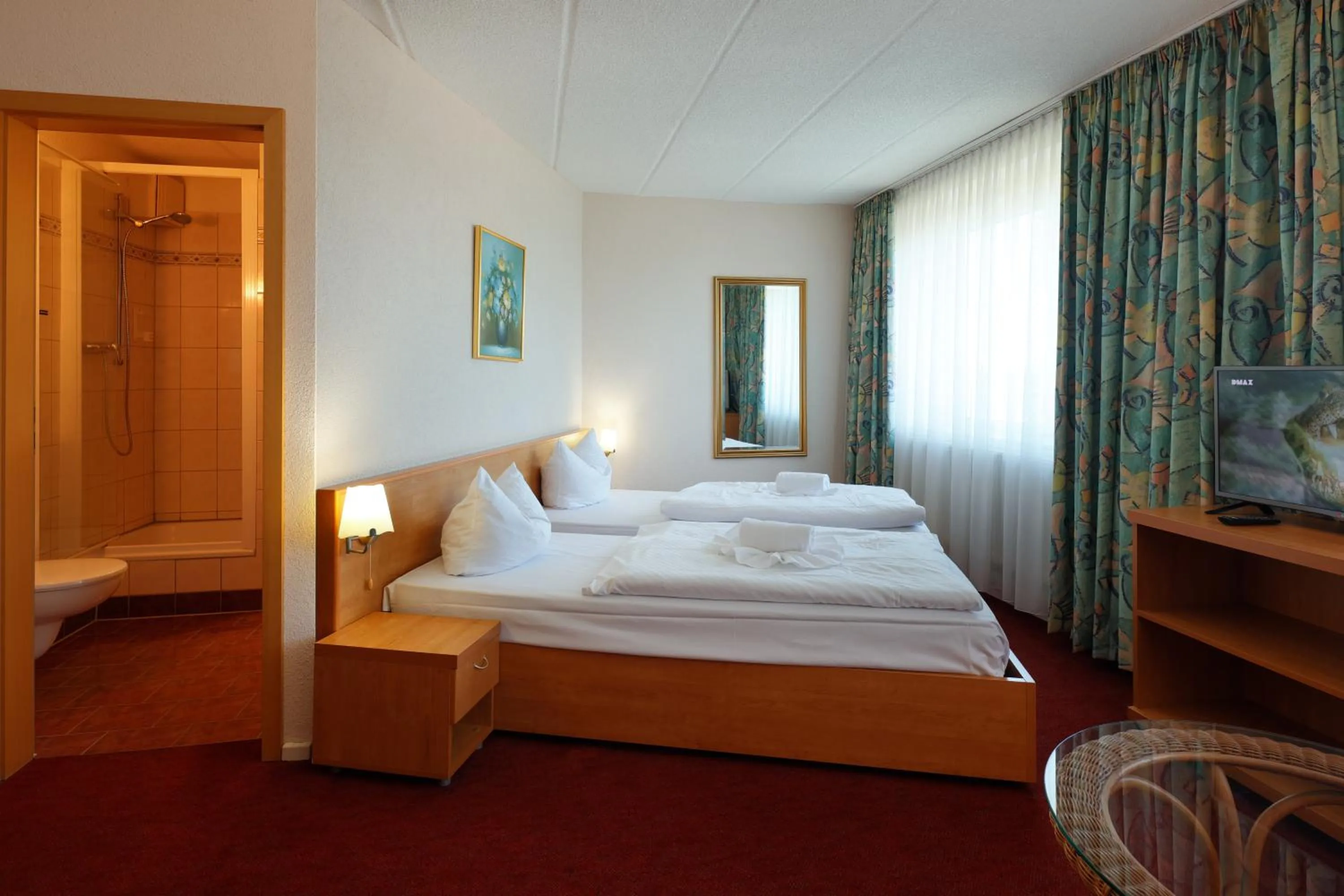 Bed in TRIP INN Axxon Hotel