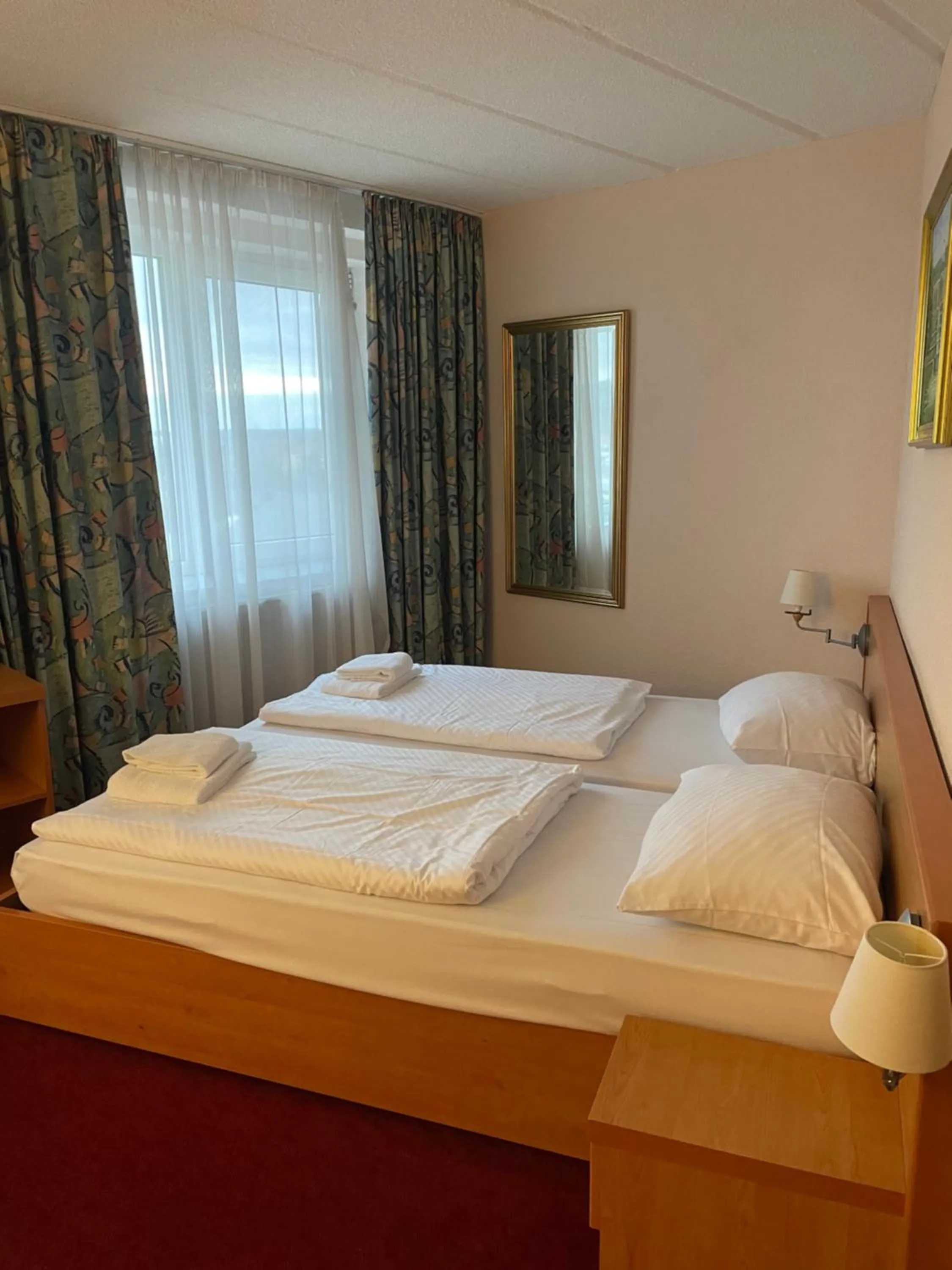 Bed in TRIP INN Axxon Hotel