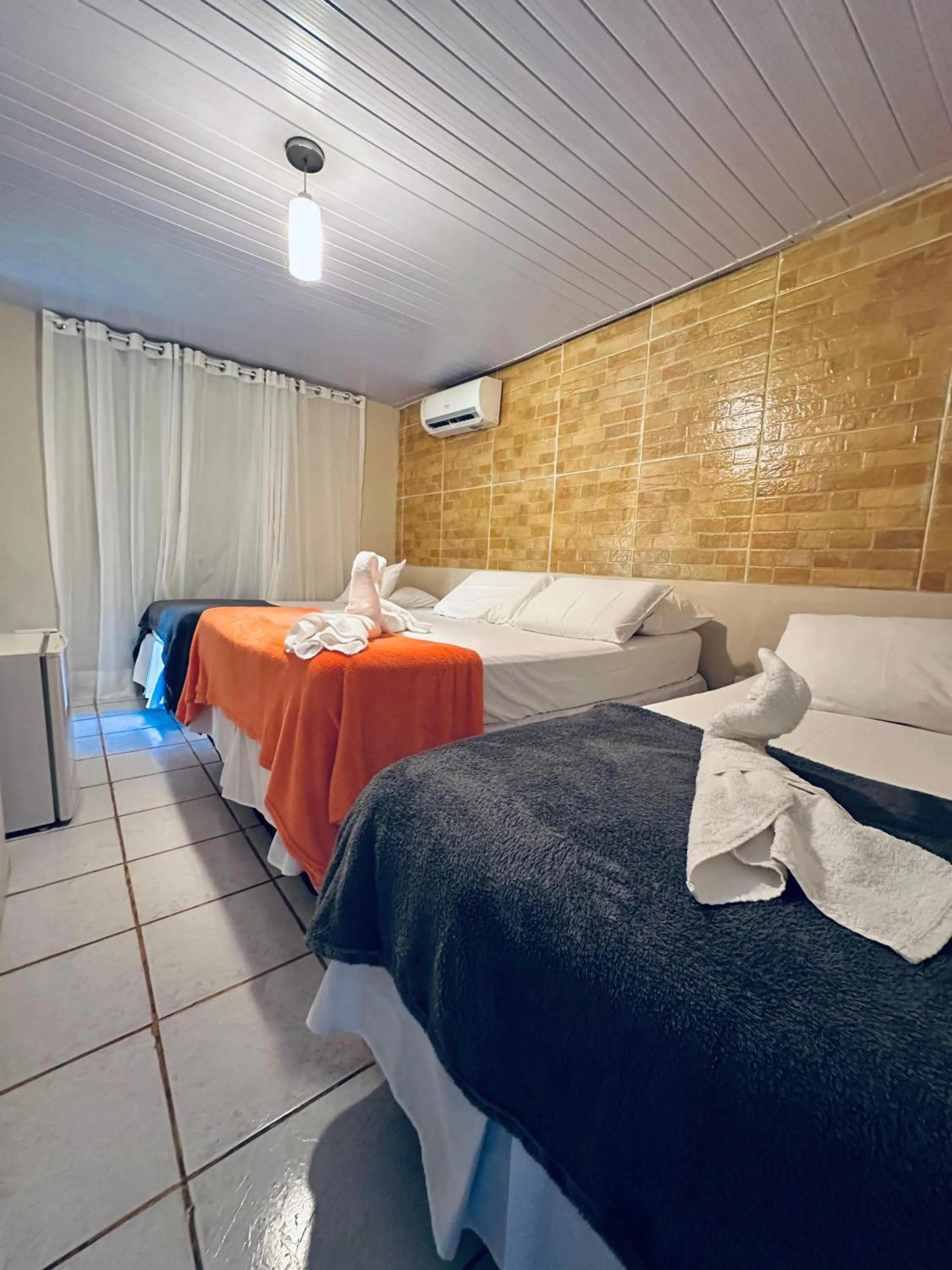 Bed in Pousada do Golfinho Fernando de Noronha