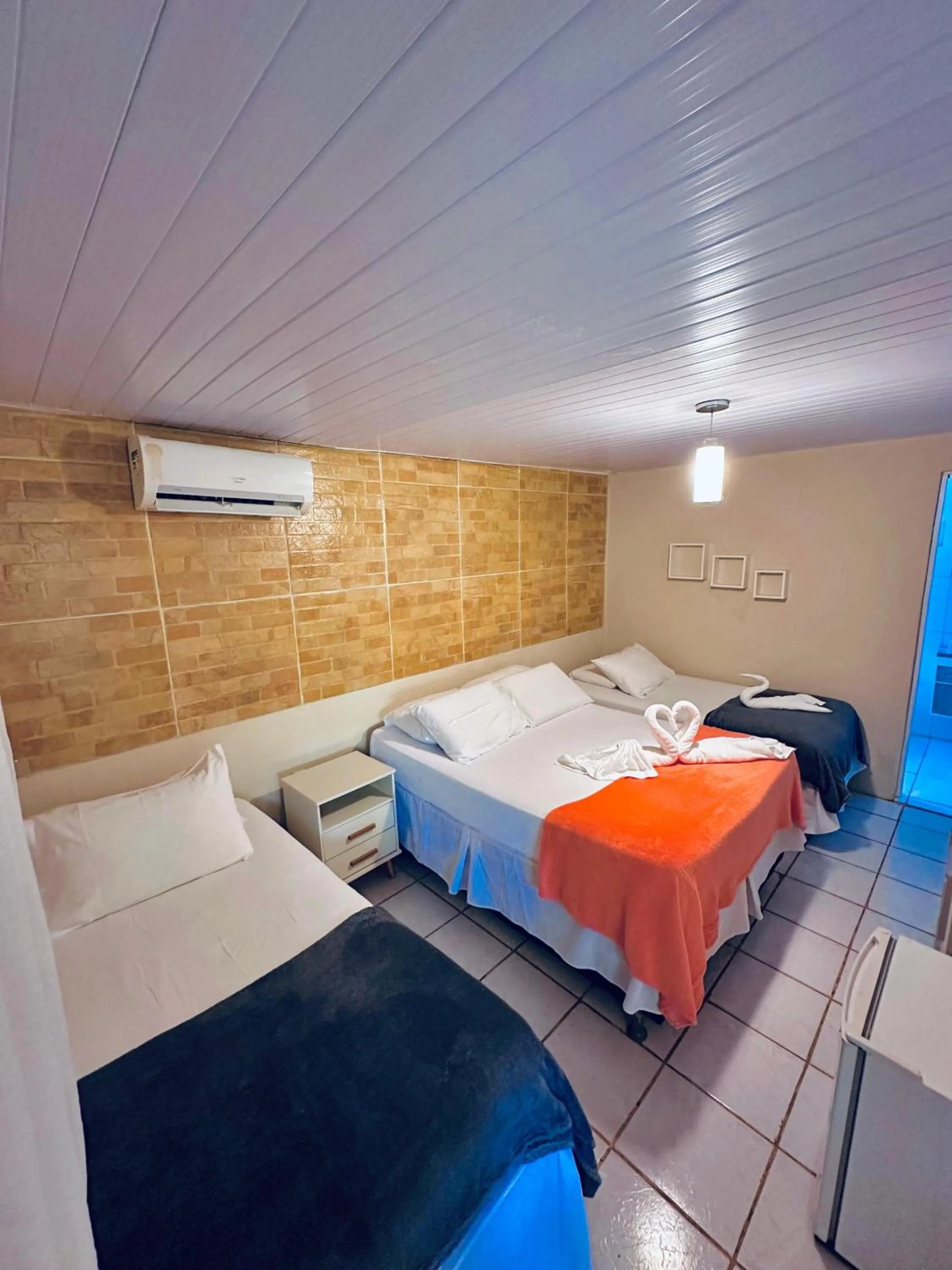 Photo of the whole room, Bed in Pousada do Golfinho Fernando de Noronha