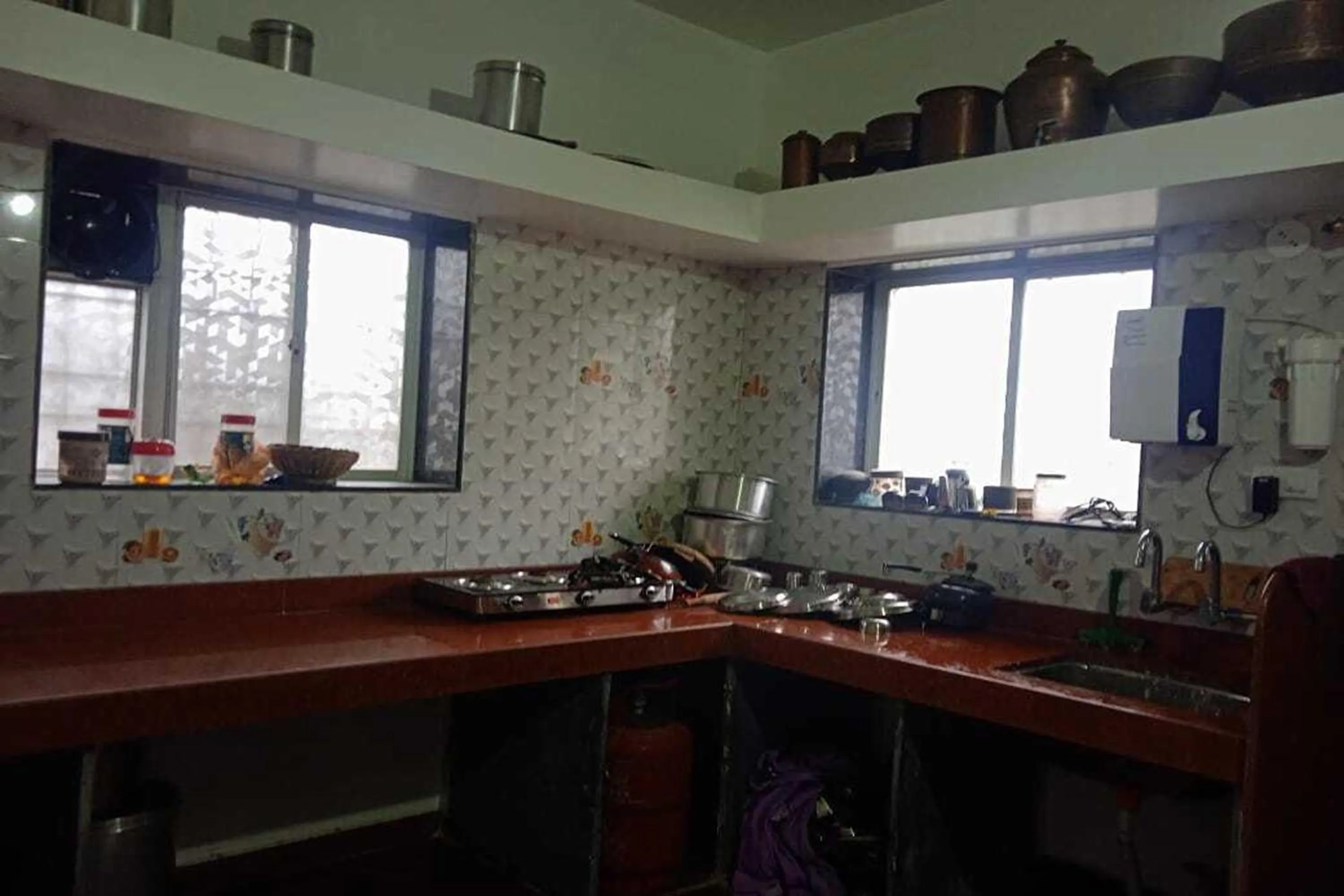 Kitchen or kitchenette in Vighnaharta Villa
