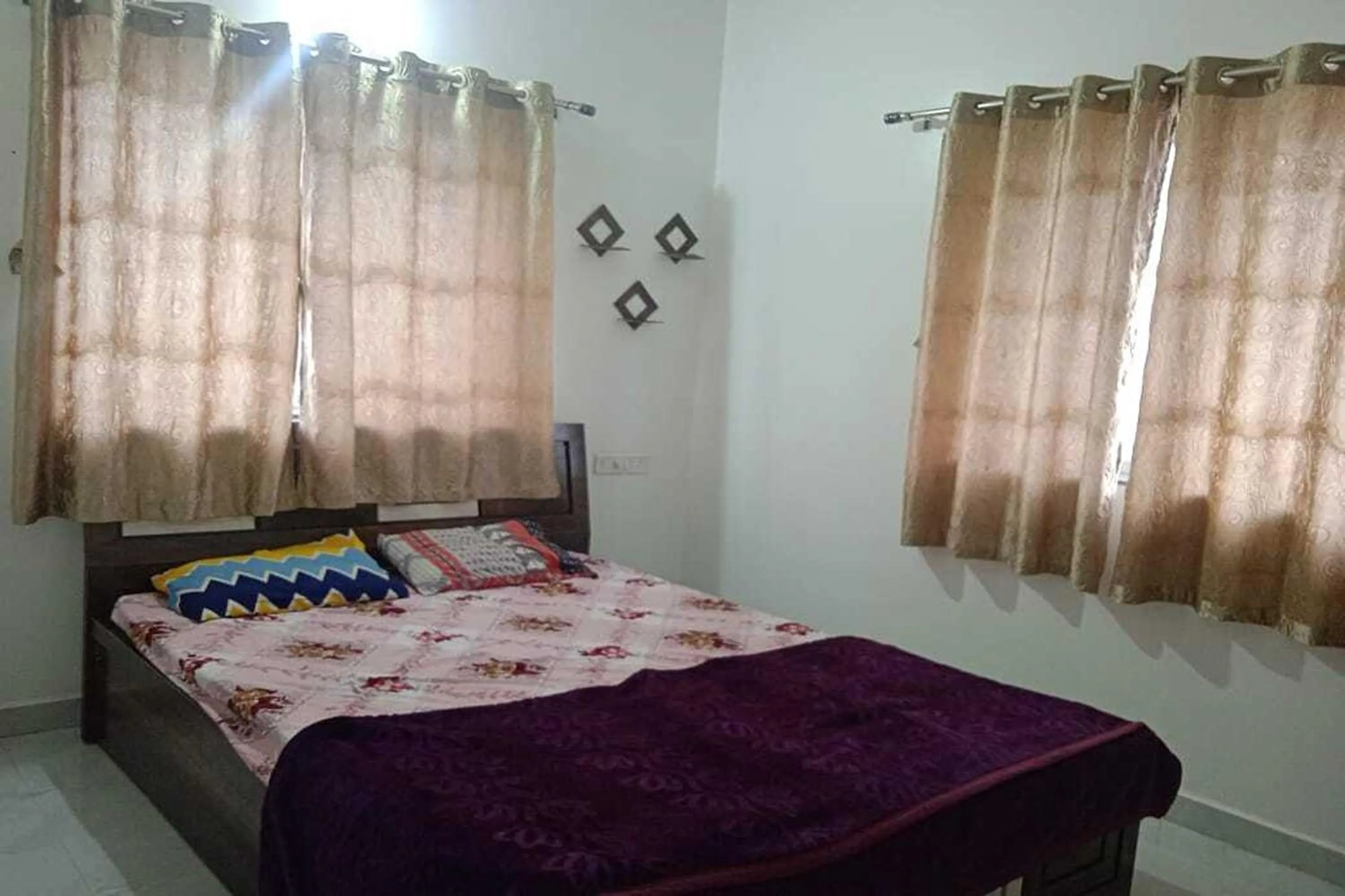 Bed in Vighnaharta Villa