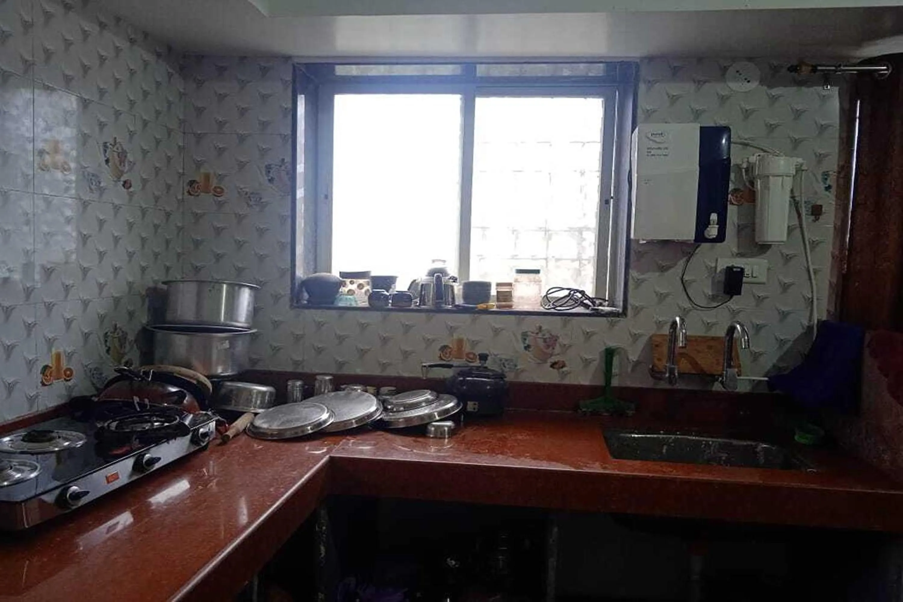 Kitchen or kitchenette in Vighnaharta Villa