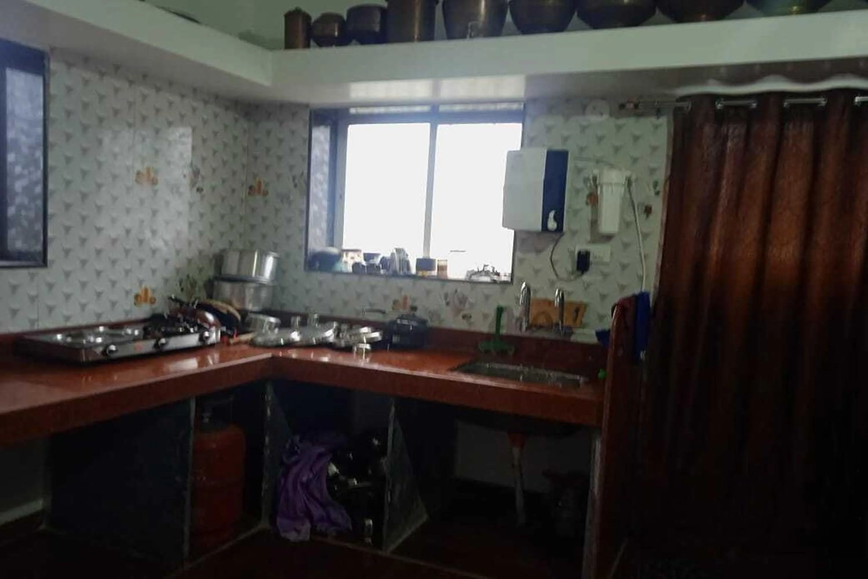 Kitchen or kitchenette in Vighnaharta Villa