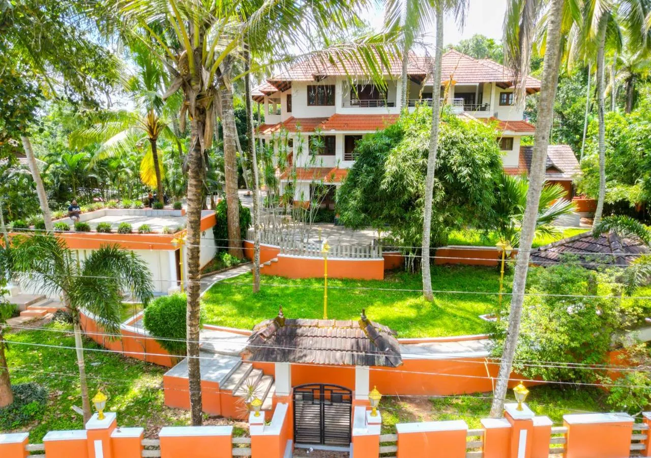 Property building in Ushasree Wayanad Premium Pool Resort by VOYE HOMES