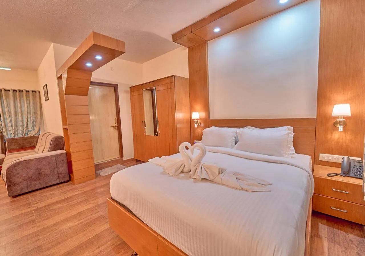 Bed in Ushasree Wayanad Premium Pool Resort by VOYE HOMES