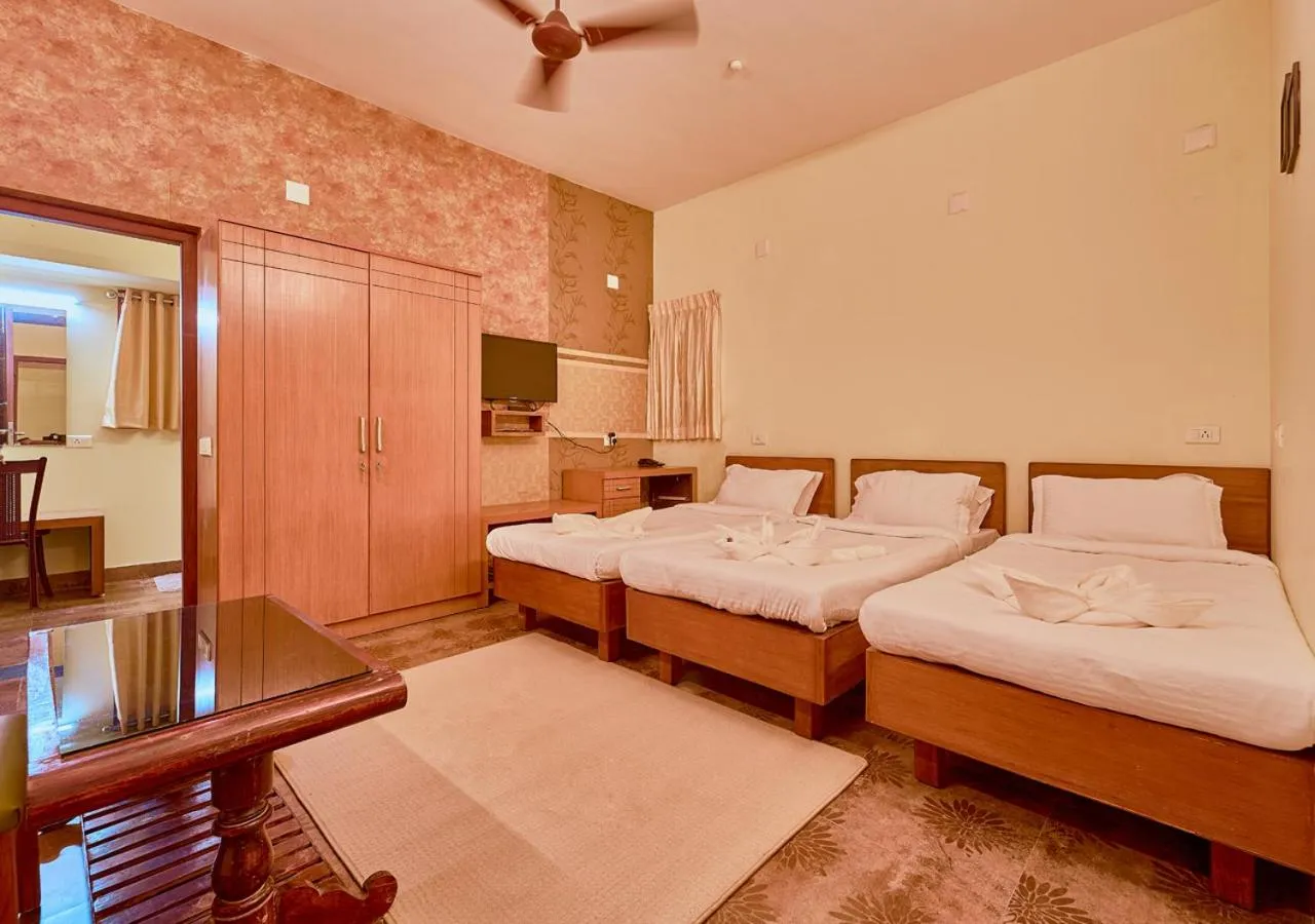 Photo of the whole room, Bed in Ushasree Wayanad Premium Pool Resort by VOYE HOMES