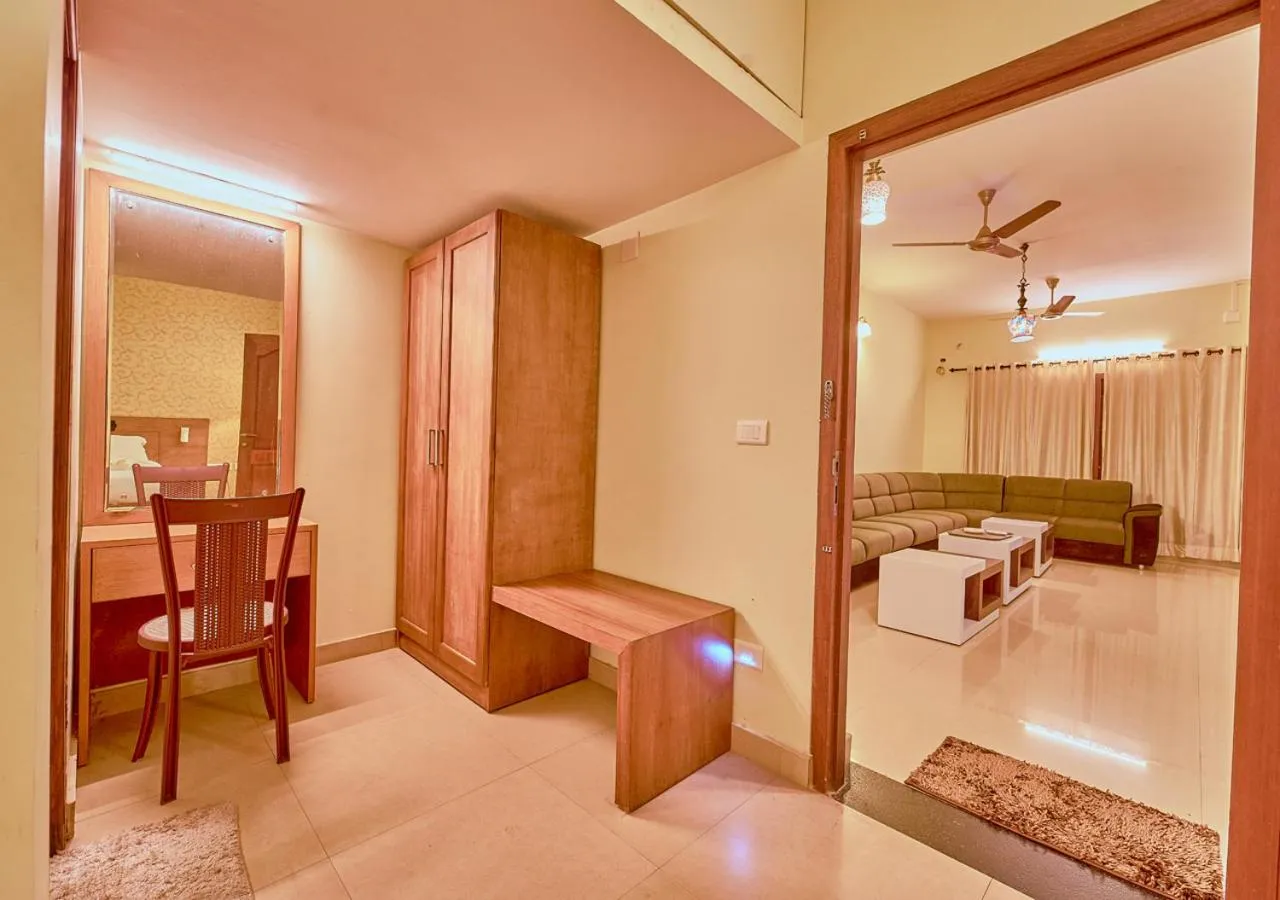 Living room, Bed in Ushasree Wayanad Premium Pool Resort by VOYE HOMES