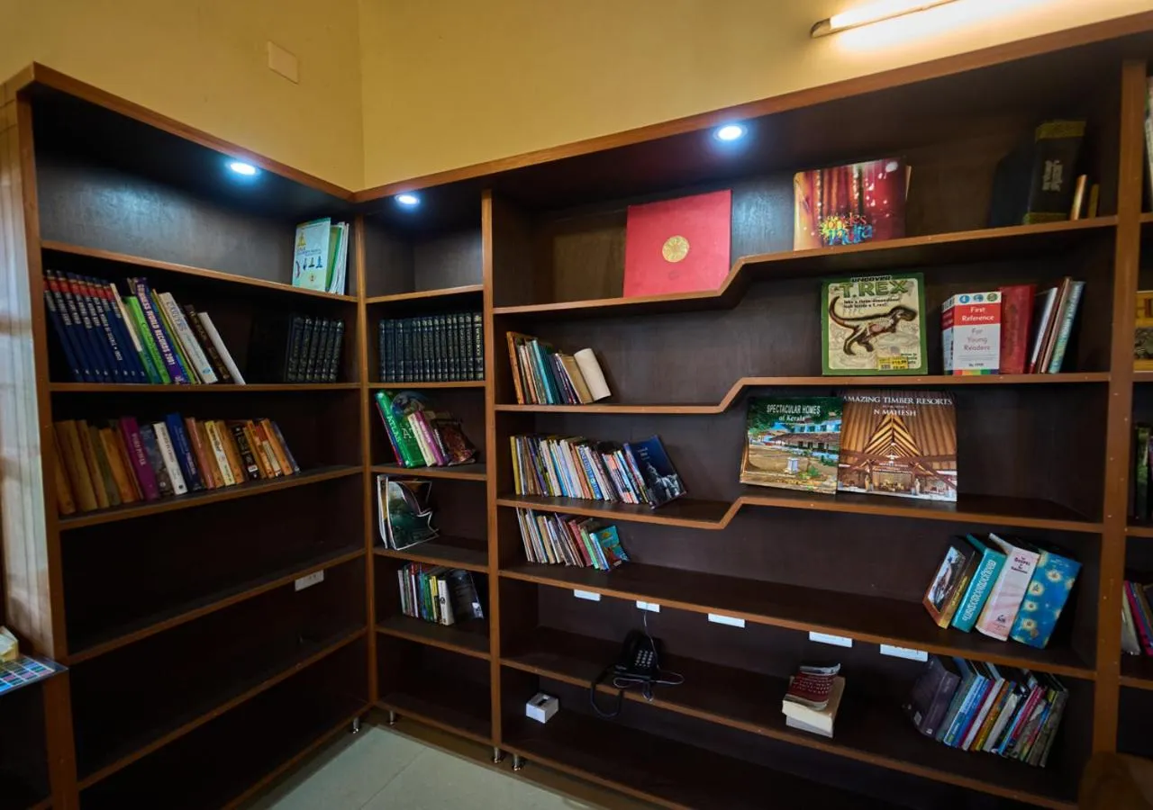 Library in Ushasree Wayanad Premium Pool Resort by VOYE HOMES