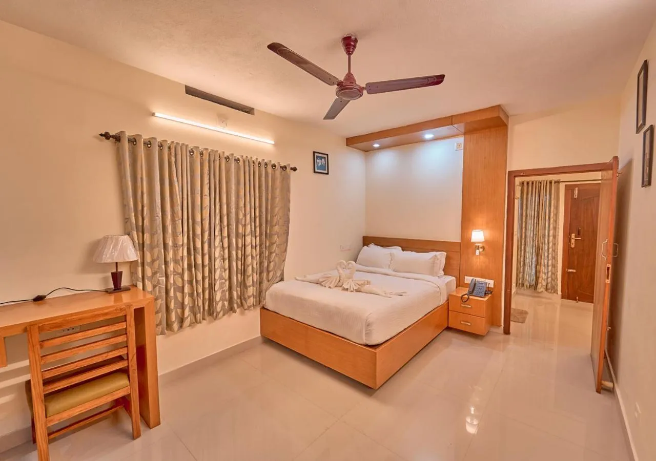 Bed in Ushasree Wayanad Premium Pool Resort by VOYE HOMES