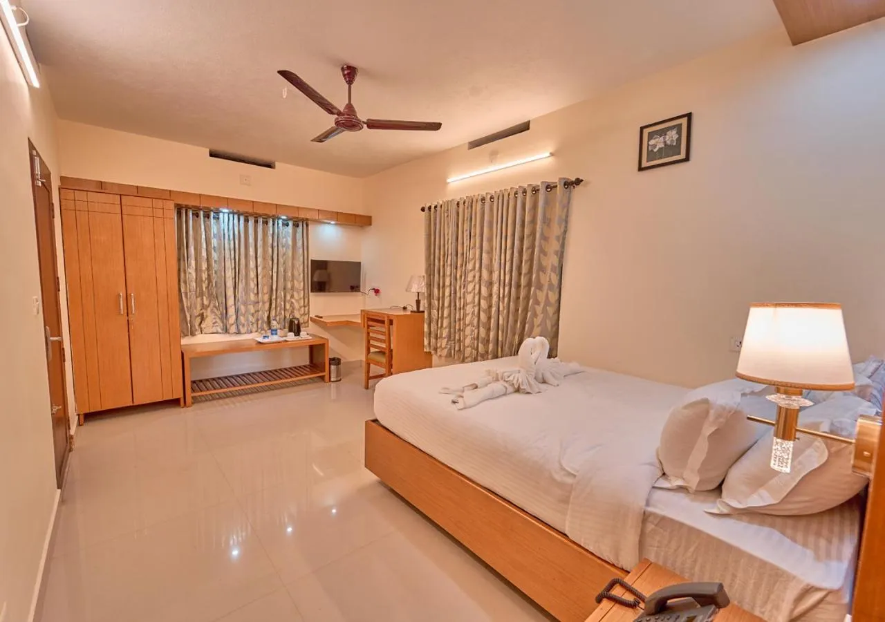 Bed in Ushasree Wayanad Premium Pool Resort by VOYE HOMES
