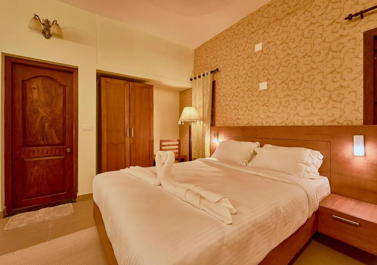 Bed in Ushasree Wayanad Premium Pool Resort by VOYE HOMES