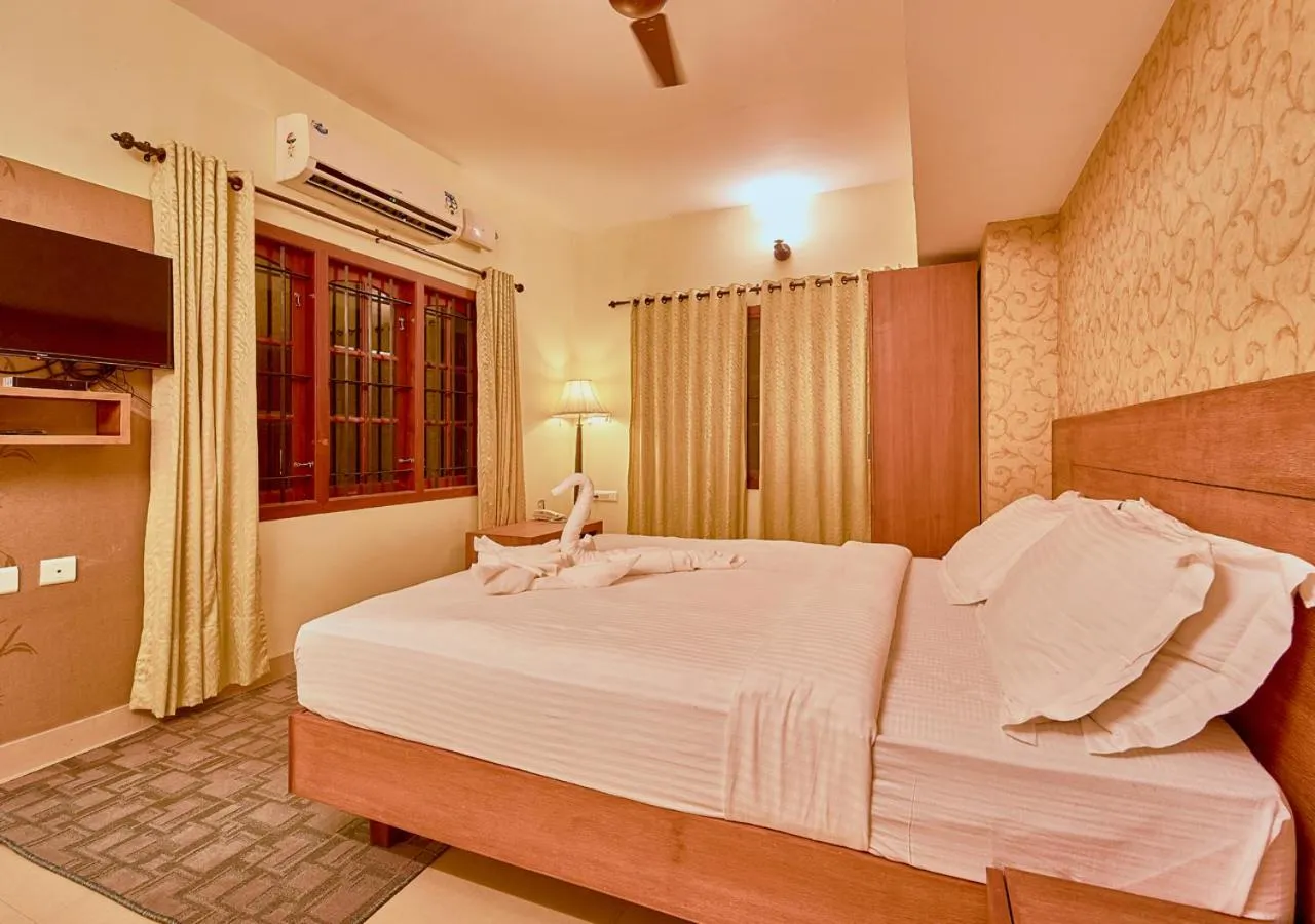 Bed in Ushasree Wayanad Premium Pool Resort by VOYE HOMES