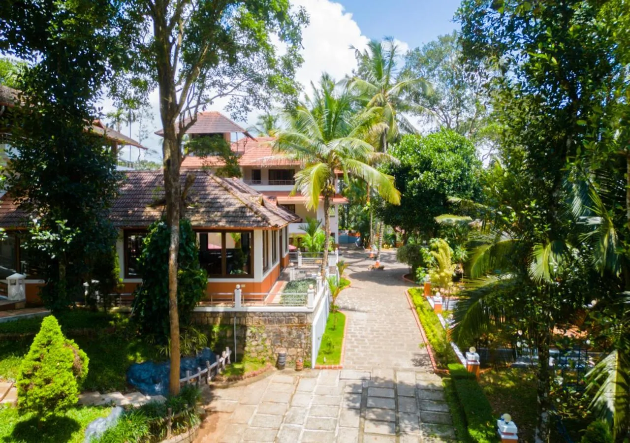 Property building in Ushasree Wayanad Premium Pool Resort by VOYE HOMES