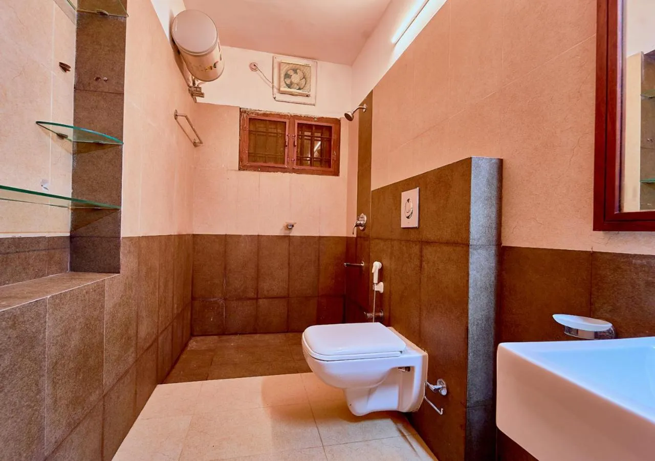 Toilet in Ushasree Wayanad Premium Pool Resort by VOYE HOMES