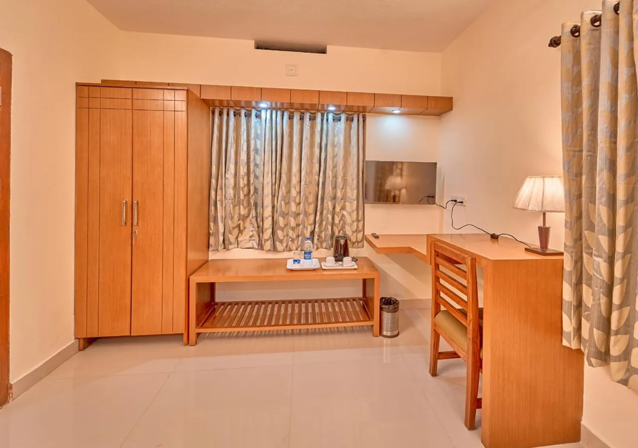 Bed in Ushasree Wayanad Premium Pool Resort by VOYE HOMES