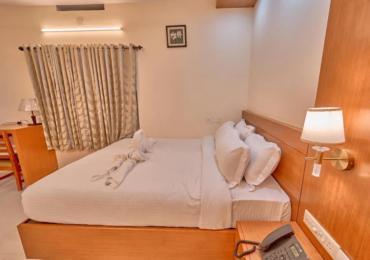 Bed in Ushasree Wayanad Premium Pool Resort by VOYE HOMES