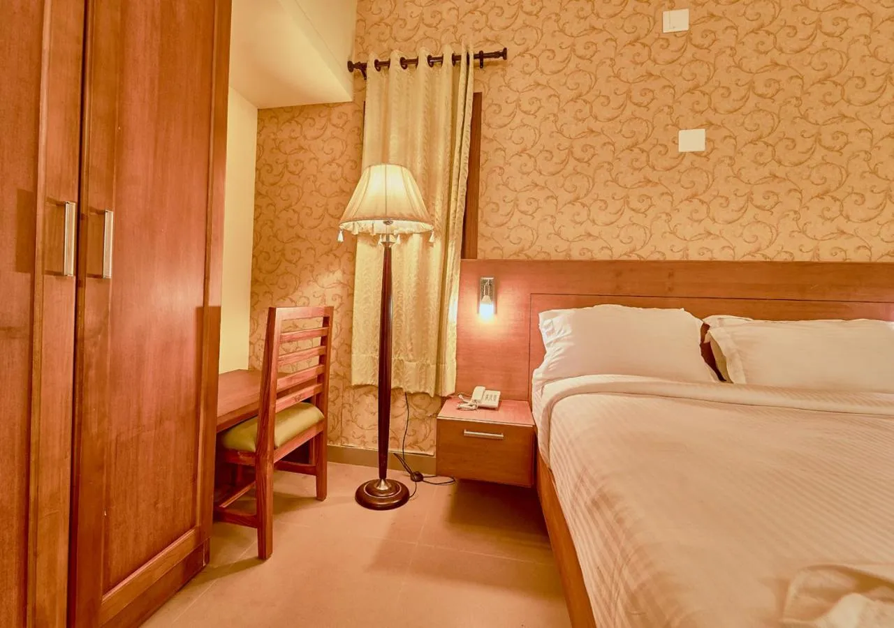 Photo of the whole room, Bed in Ushasree Wayanad Premium Pool Resort by VOYE HOMES