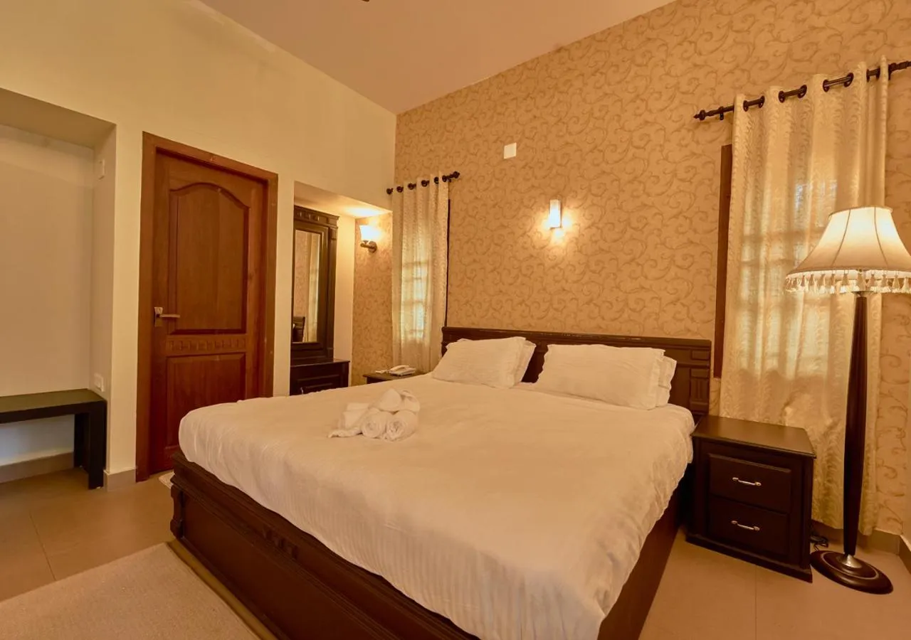 Photo of the whole room, Bed in Ushasree Wayanad Premium Pool Resort by VOYE HOMES