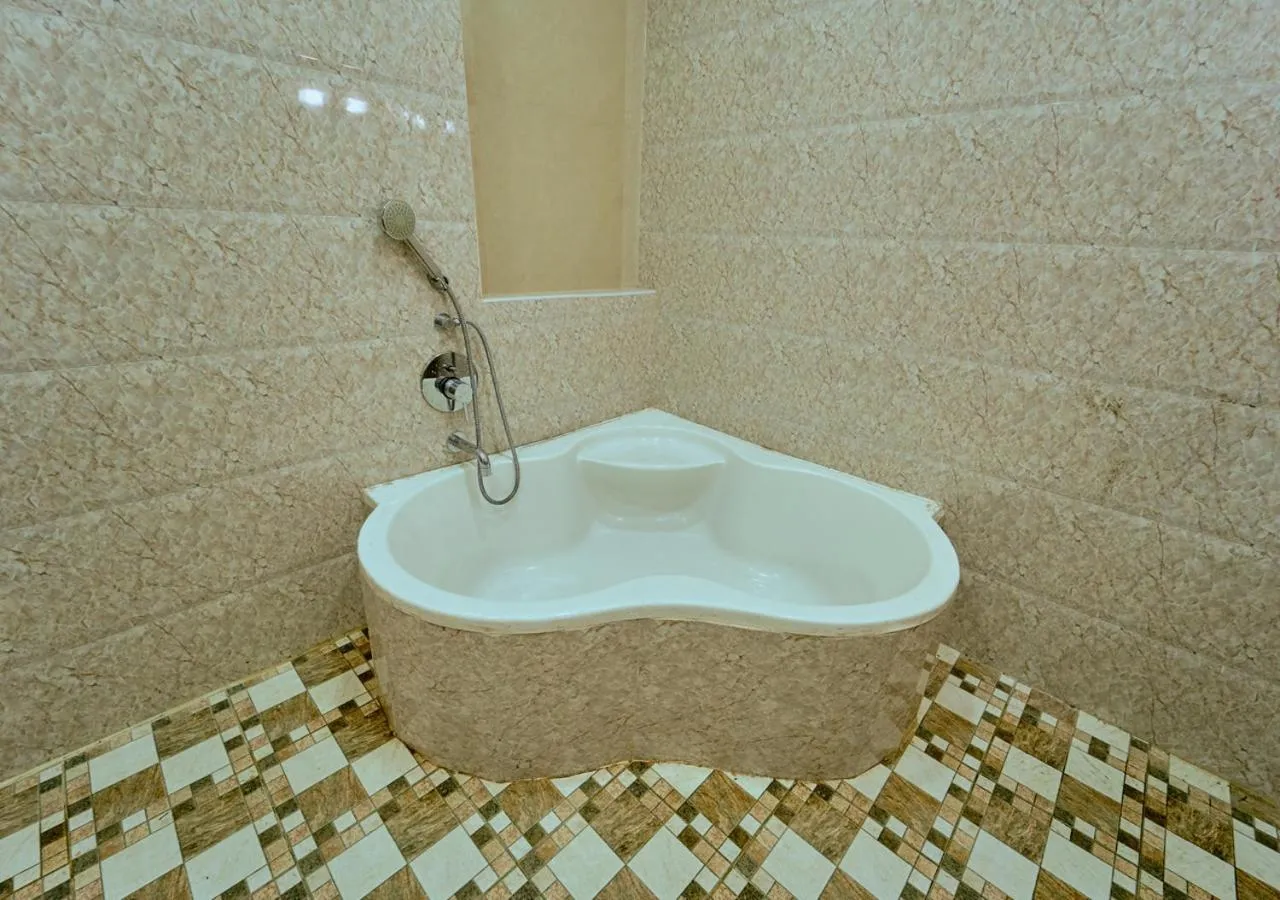 Bath in Ushasree Wayanad Premium Pool Resort by VOYE HOMES