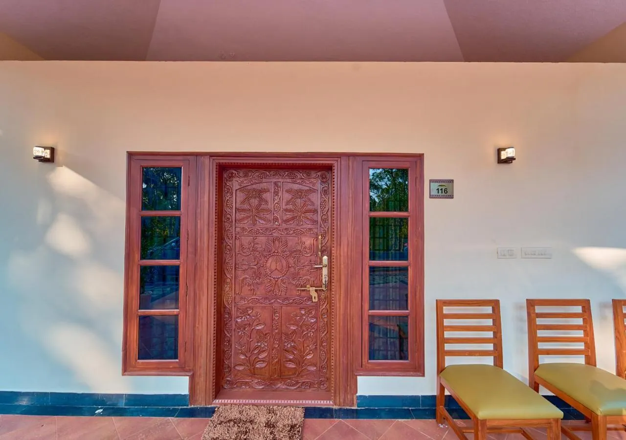 Seating area in Ushasree Wayanad Premium Pool Resort by VOYE HOMES