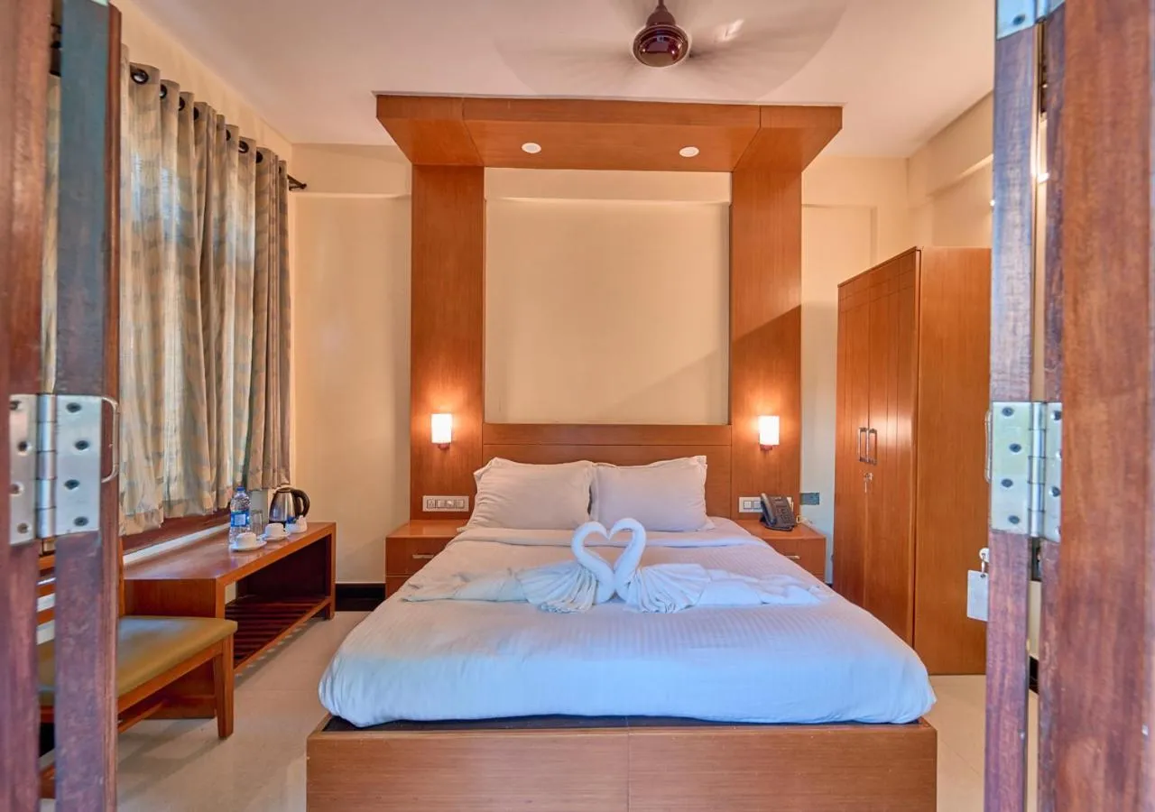 Bed in Ushasree Wayanad Premium Pool Resort by VOYE HOMES