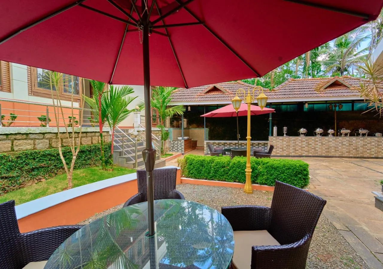 Property building in Ushasree Wayanad Premium Pool Resort by VOYE HOMES