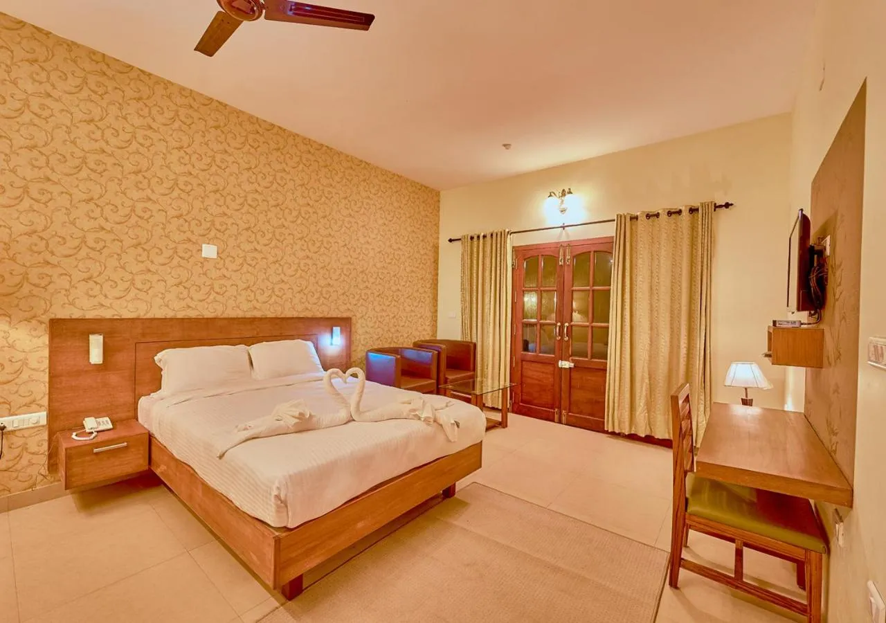 Photo of the whole room, Bed in Ushasree Wayanad Premium Pool Resort by VOYE HOMES