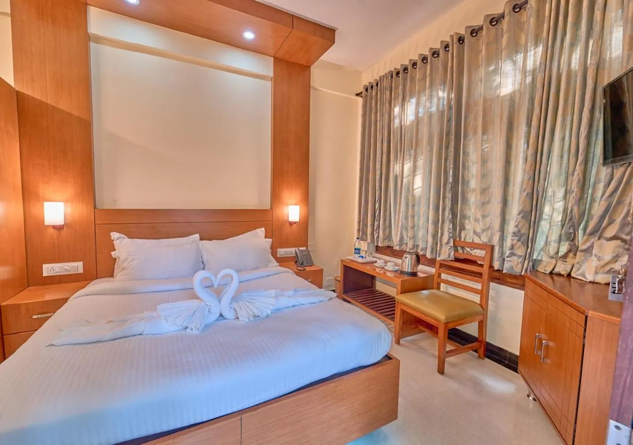 Bed in Ushasree Wayanad Premium Pool Resort by VOYE HOMES