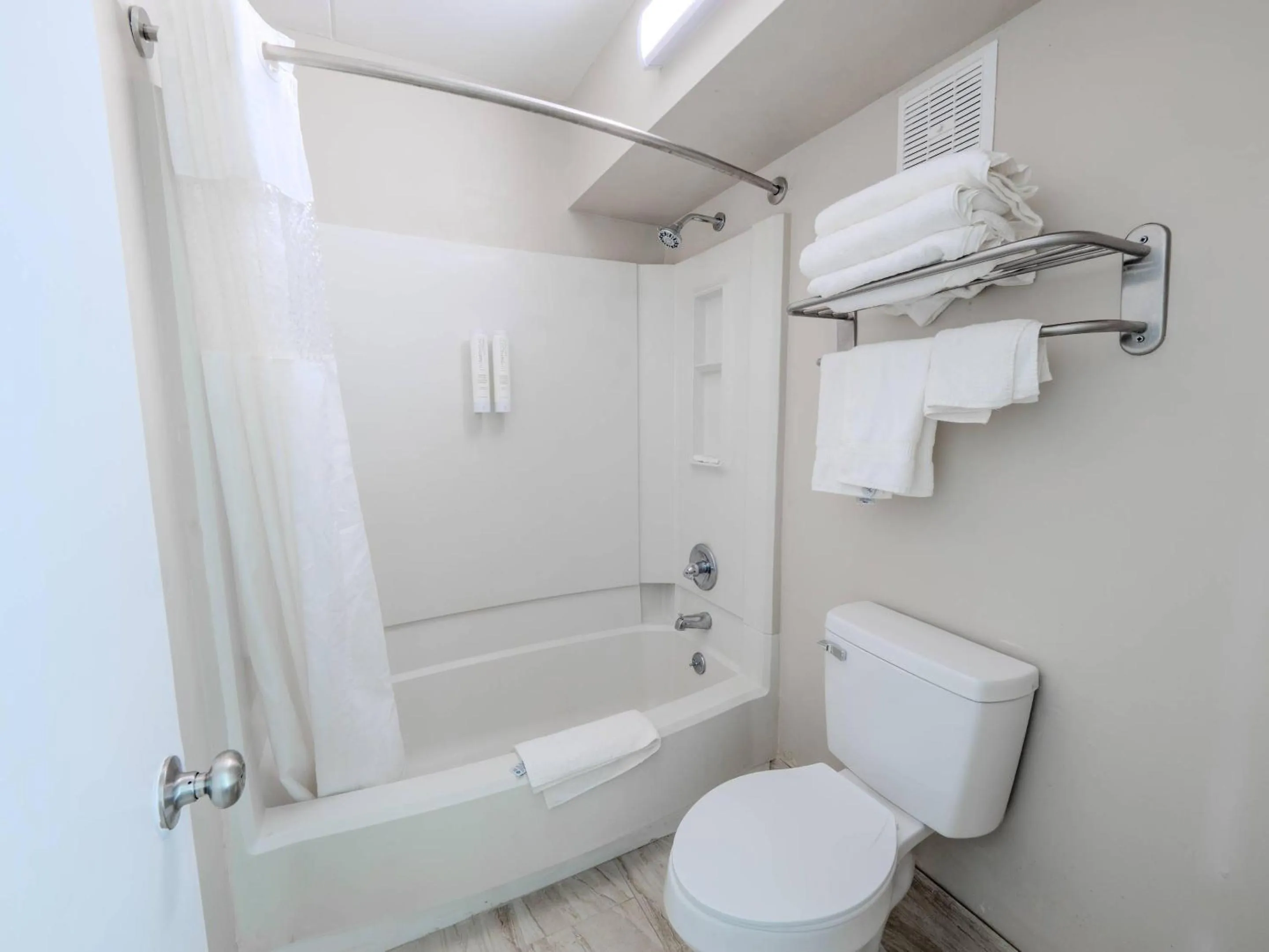 Bedroom in Clarion Pointe Winston - Salem Downtown